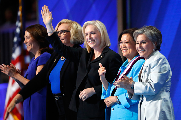 Sen. Maria Cantwell (D-WA), Sen. Claire McCaskill (D-MO), Sen. Kirsten Gillibrand (D-NY), Sen. Mazie Hirono (D-HI), and Sen. Barbara Boxer (D-CA) acknowledge the crowd on the fourth day of the Democratic National Convention at the Wells Fargo Center, Jul