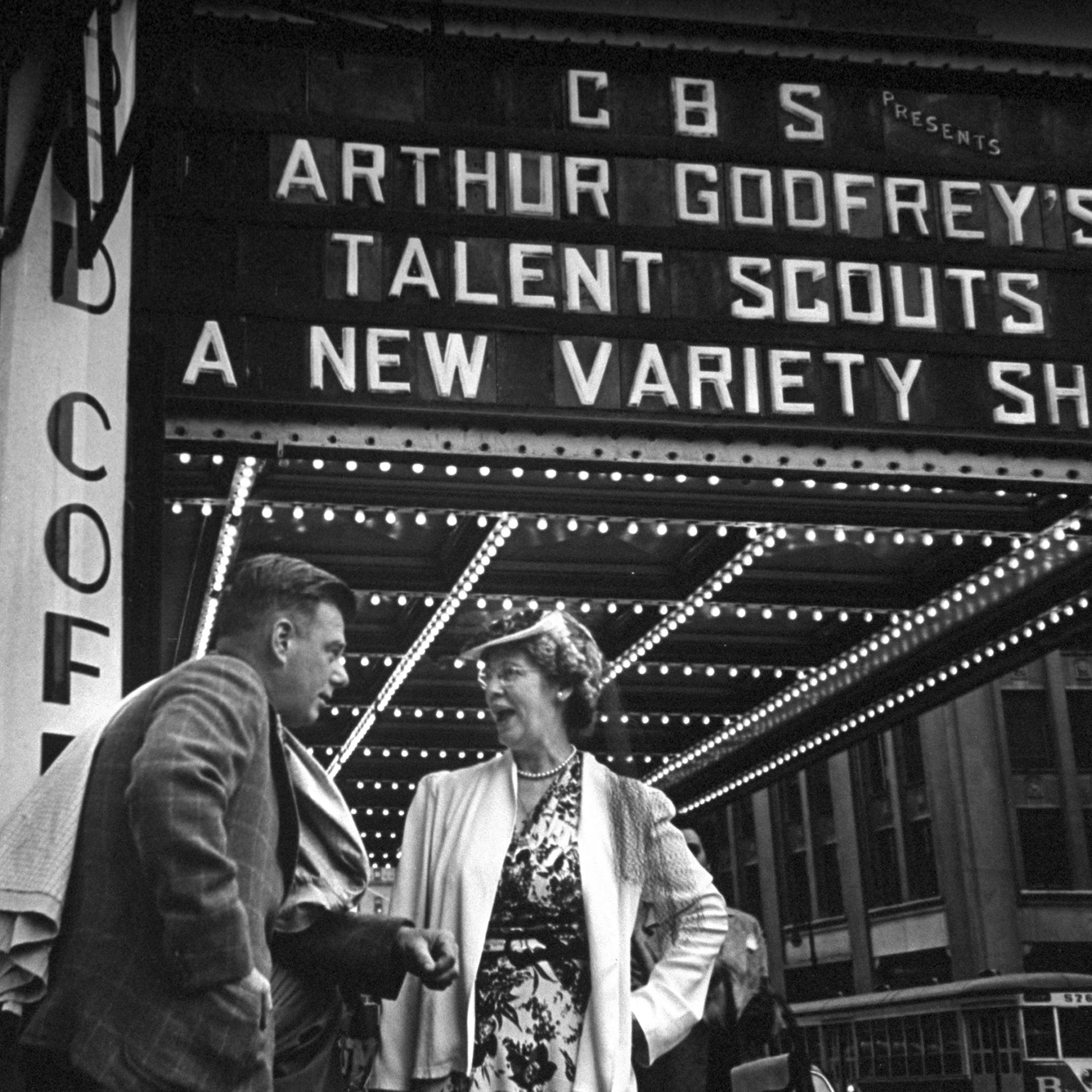 Arthur Godfrey talking to mother of girl who appeared on Godfrey's radio program, 1946.