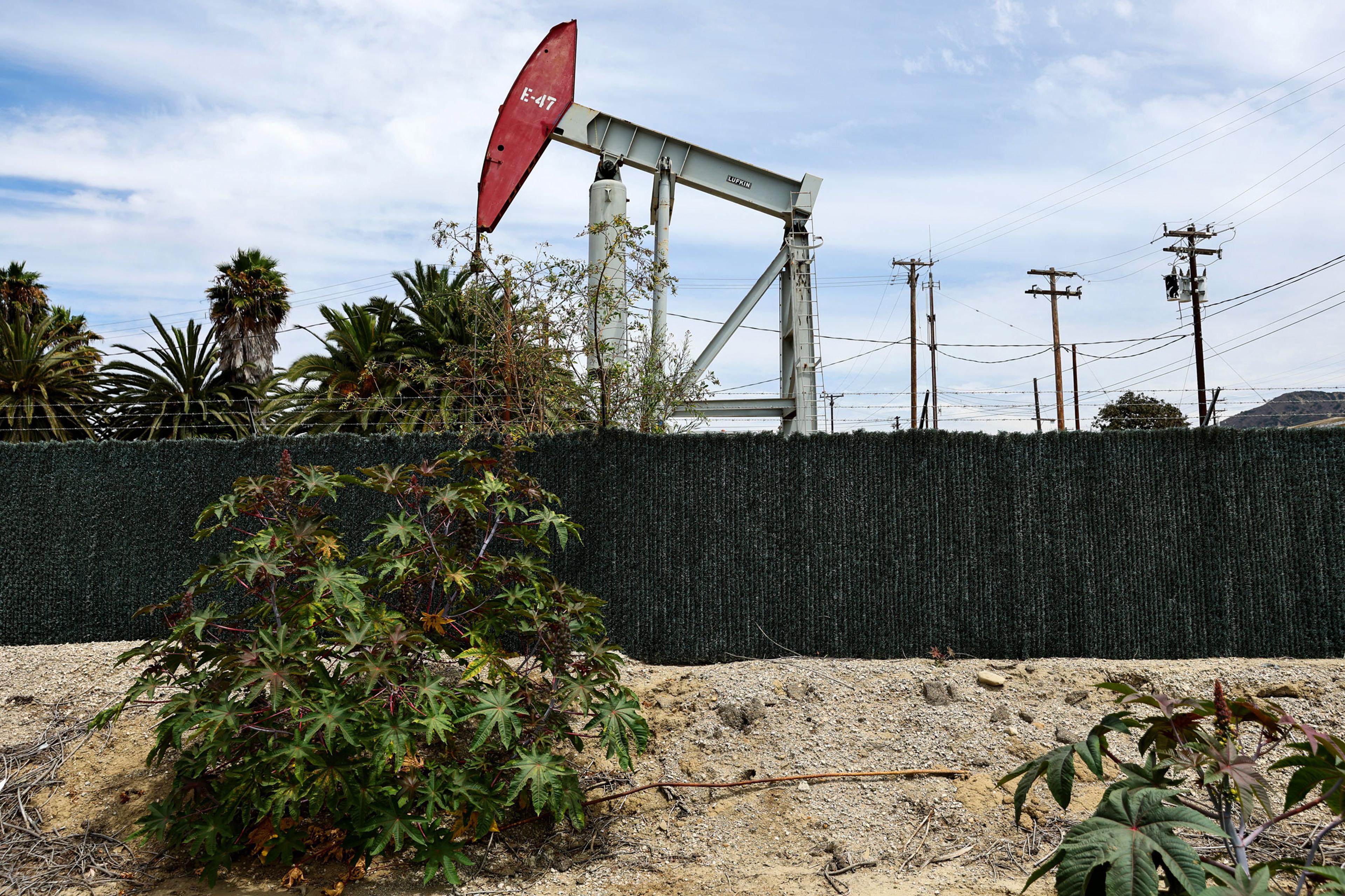 An oil pumpjack operates on August 5, 2022 near Ventura, California