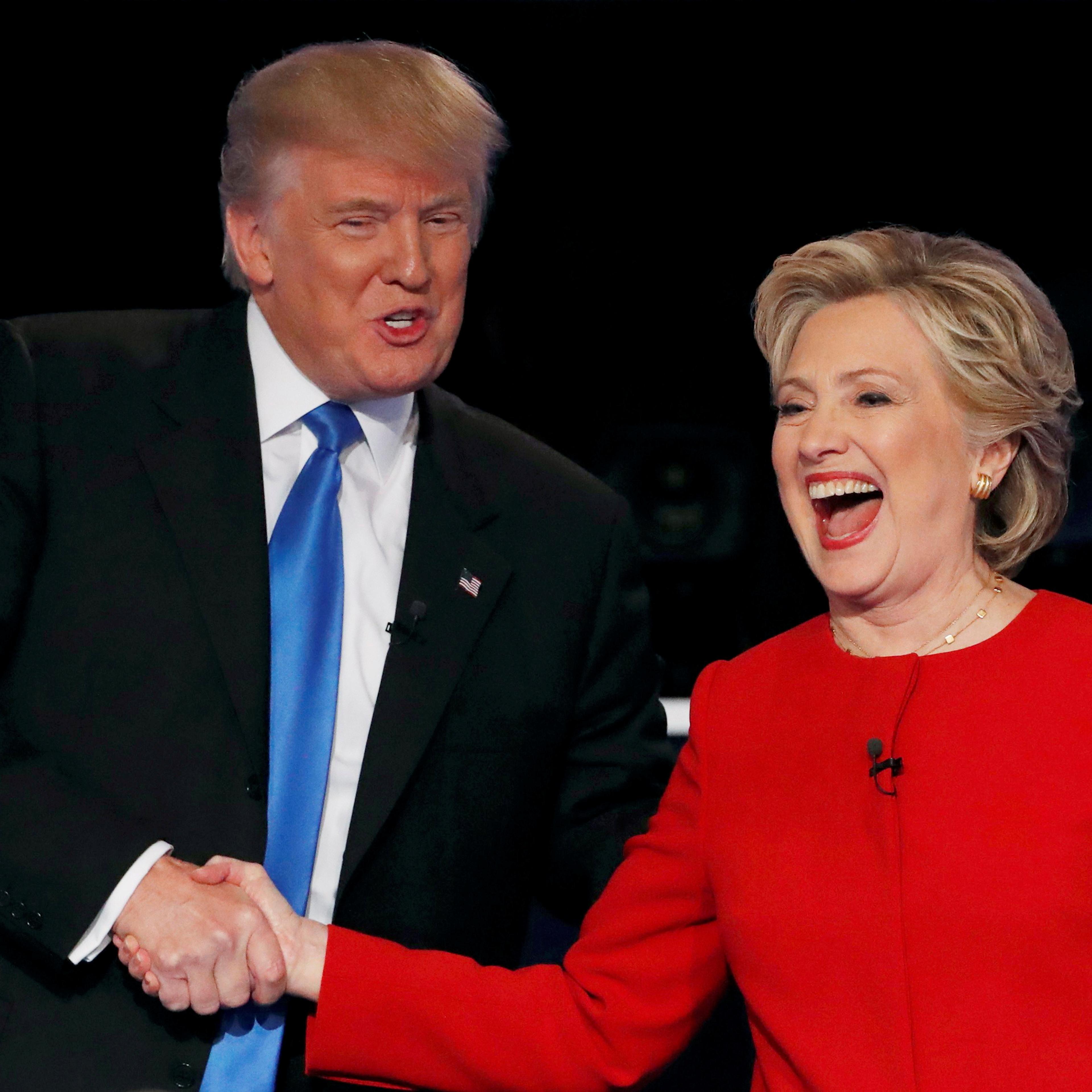 Republican U.S. presidential nominee Donald Trump shakes hands with Democratic U.S. presidential nominee Hillary Clinton at the conclusion of their first presidential debate at Hofstra University in Hempstead