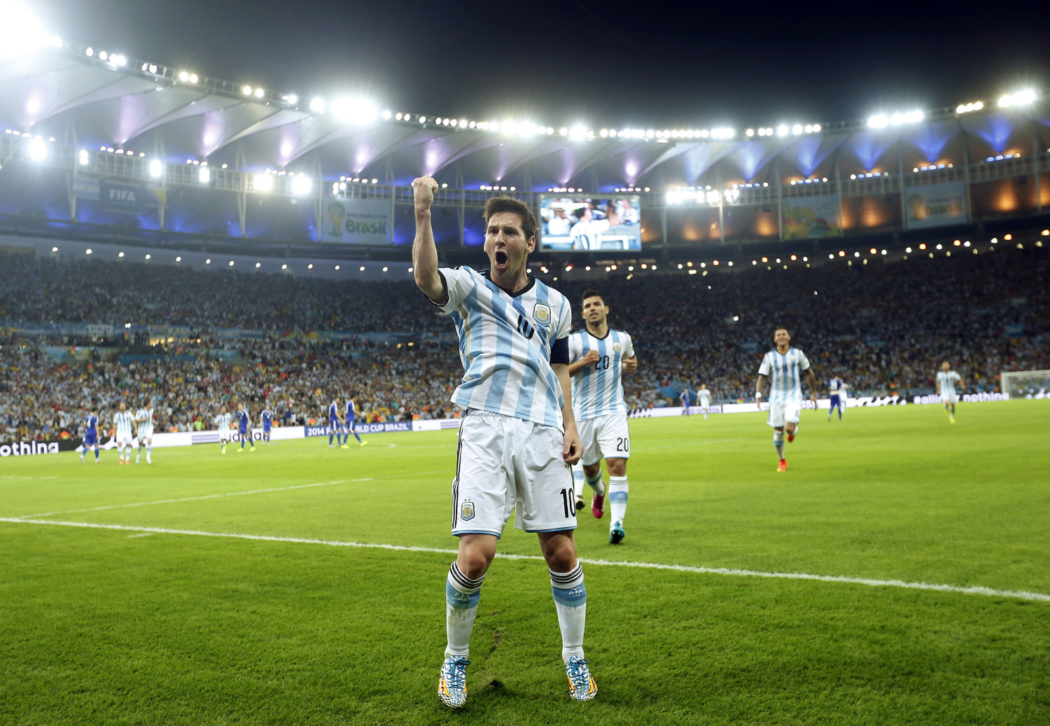 Argentina's Lionel Messi celebrates after scoring his side's second goal during the group F World Cup soccer match between Argentina and Bosnia at the Maracana Stadium in Rio de Janeiro,