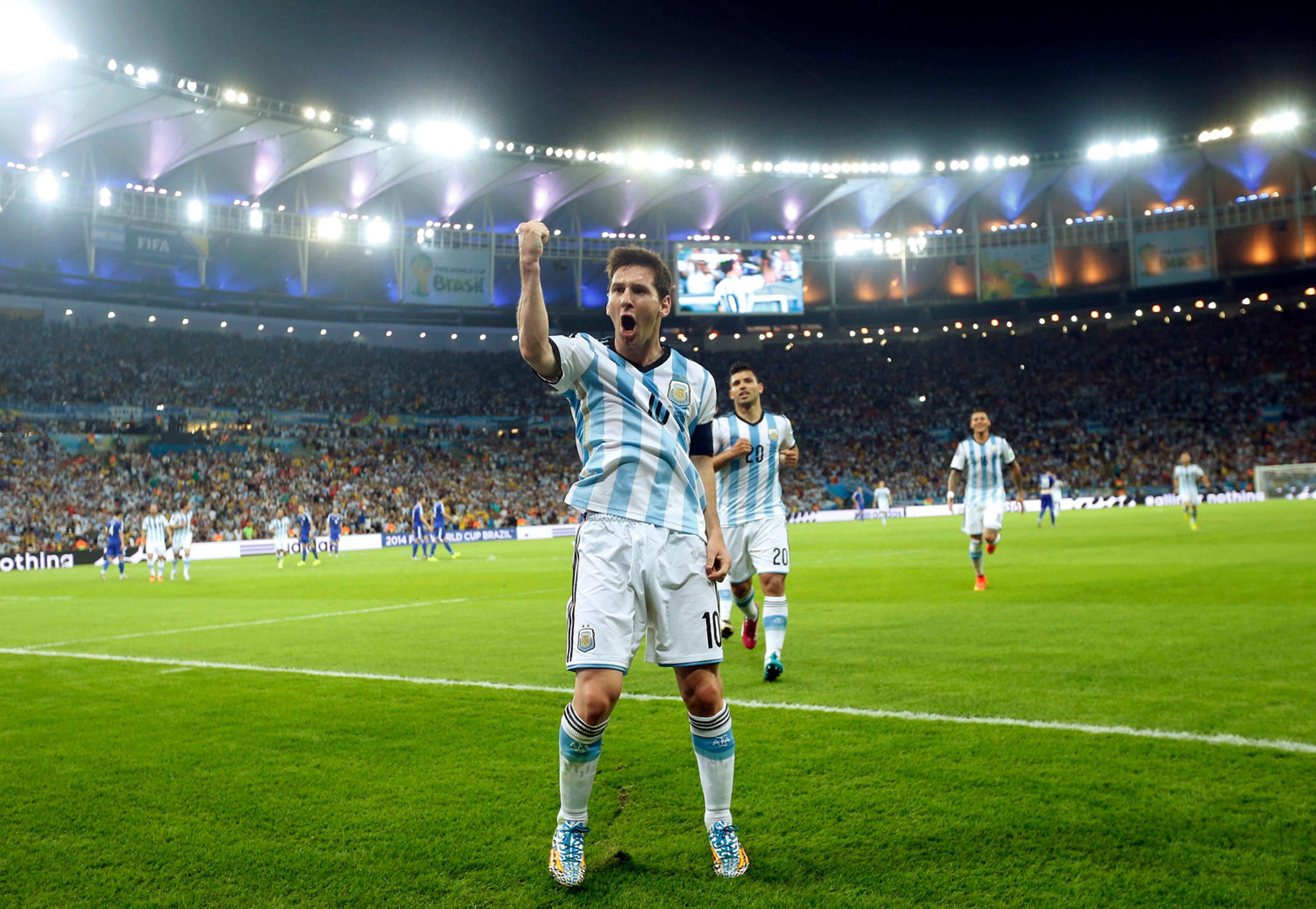 Argentina's Lionel Messi celebrates after scoring his side's second goal during the group F World Cup soccer match between Argentina and Bosnia at the Maracana Stadium in Rio de Janeiro,