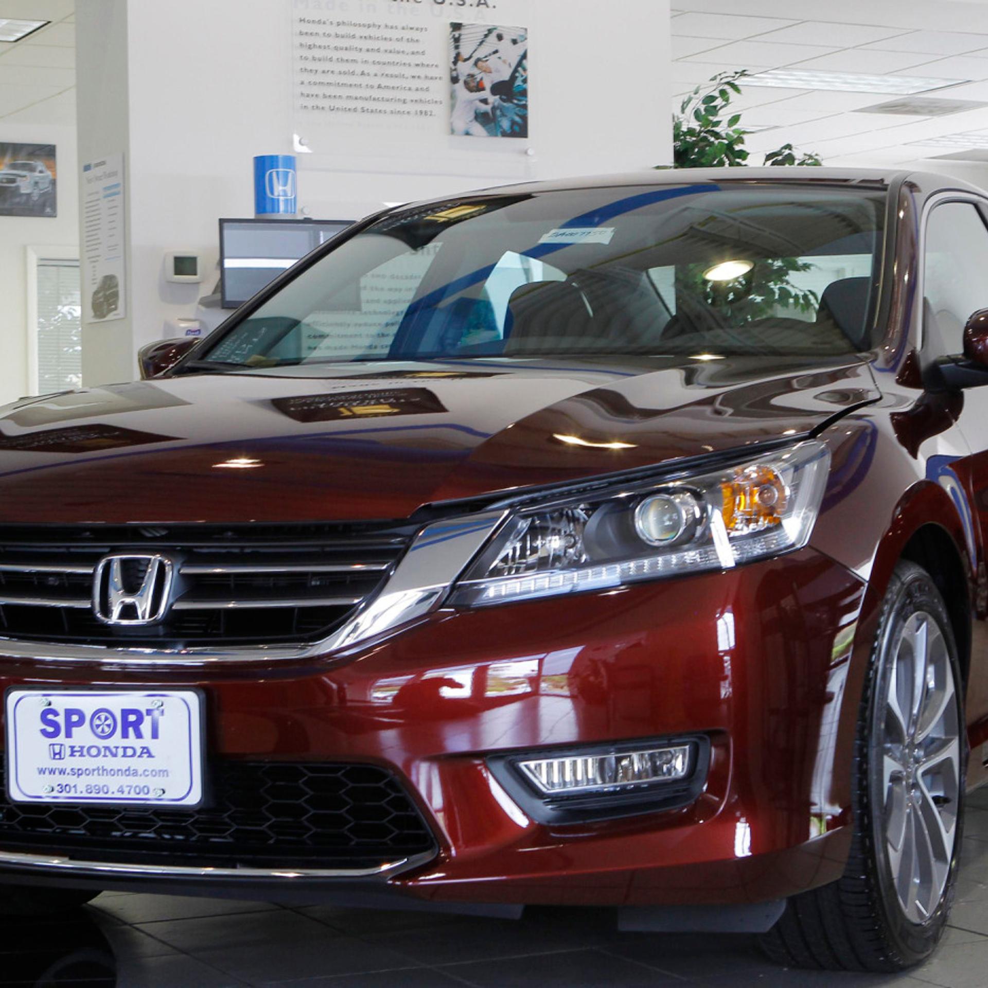 A new 2013 Honda Accord is shown on the sales floor at Sport Honda in Silver Spring, Maryland Sept. 17, 2012.