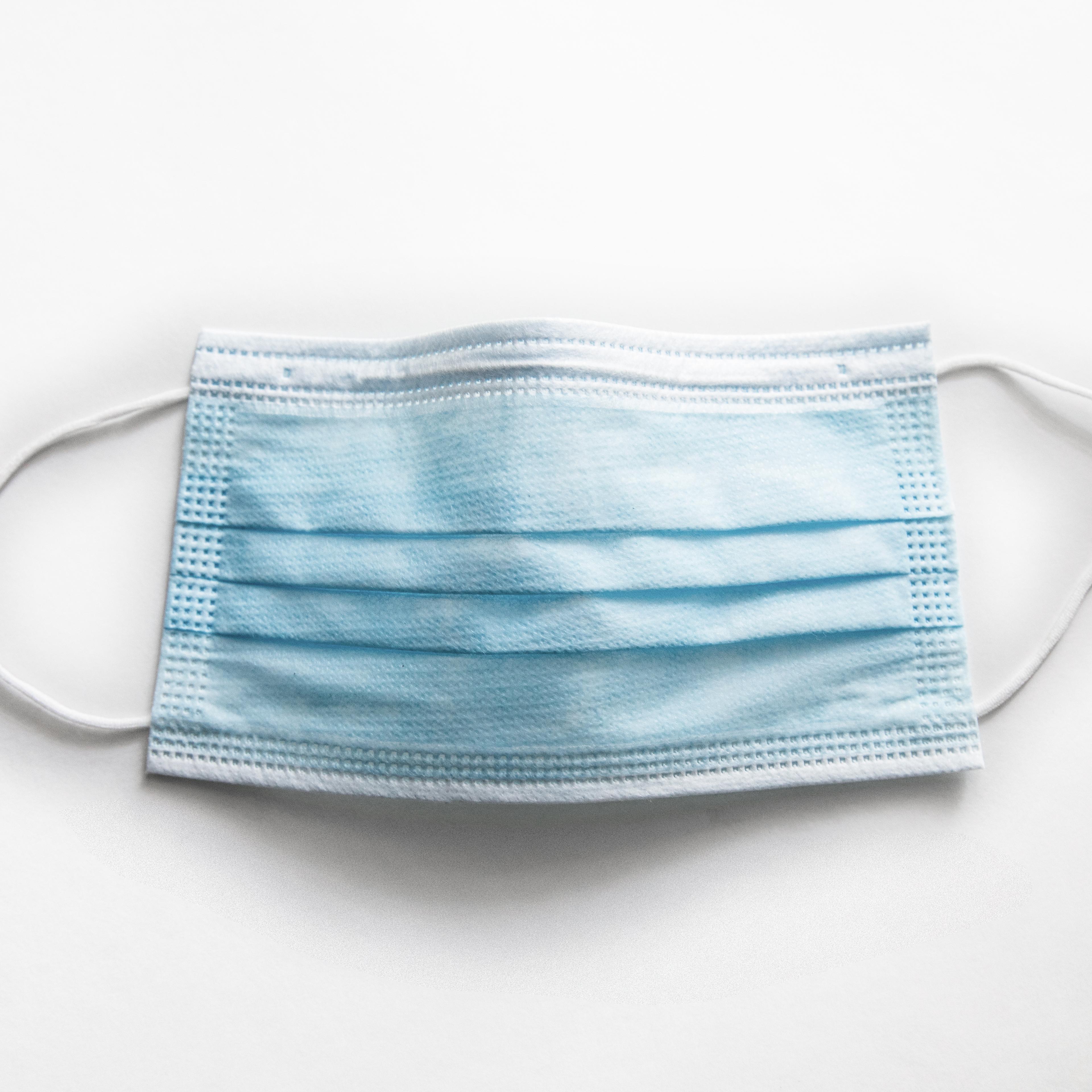 Surgical mask on white background