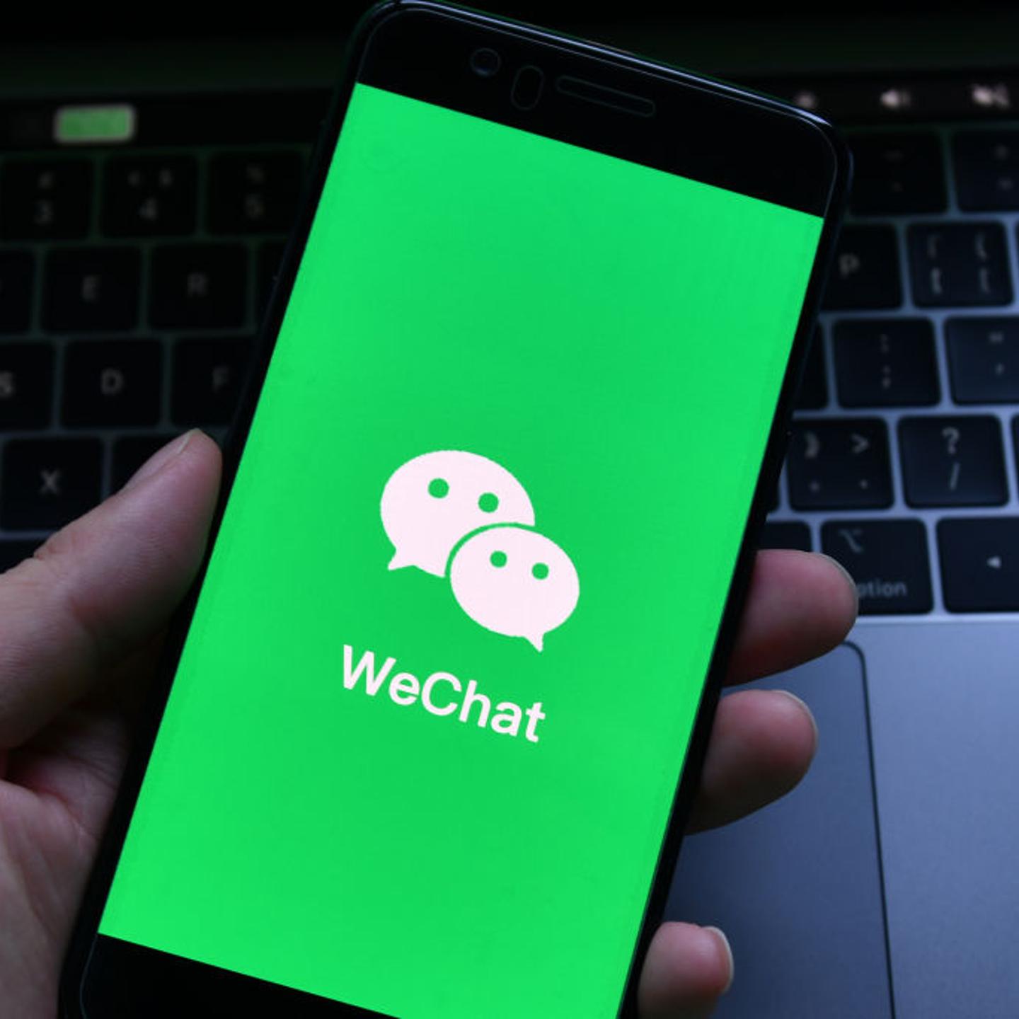 In this photo illustration, a WeChat logo seen displayed on