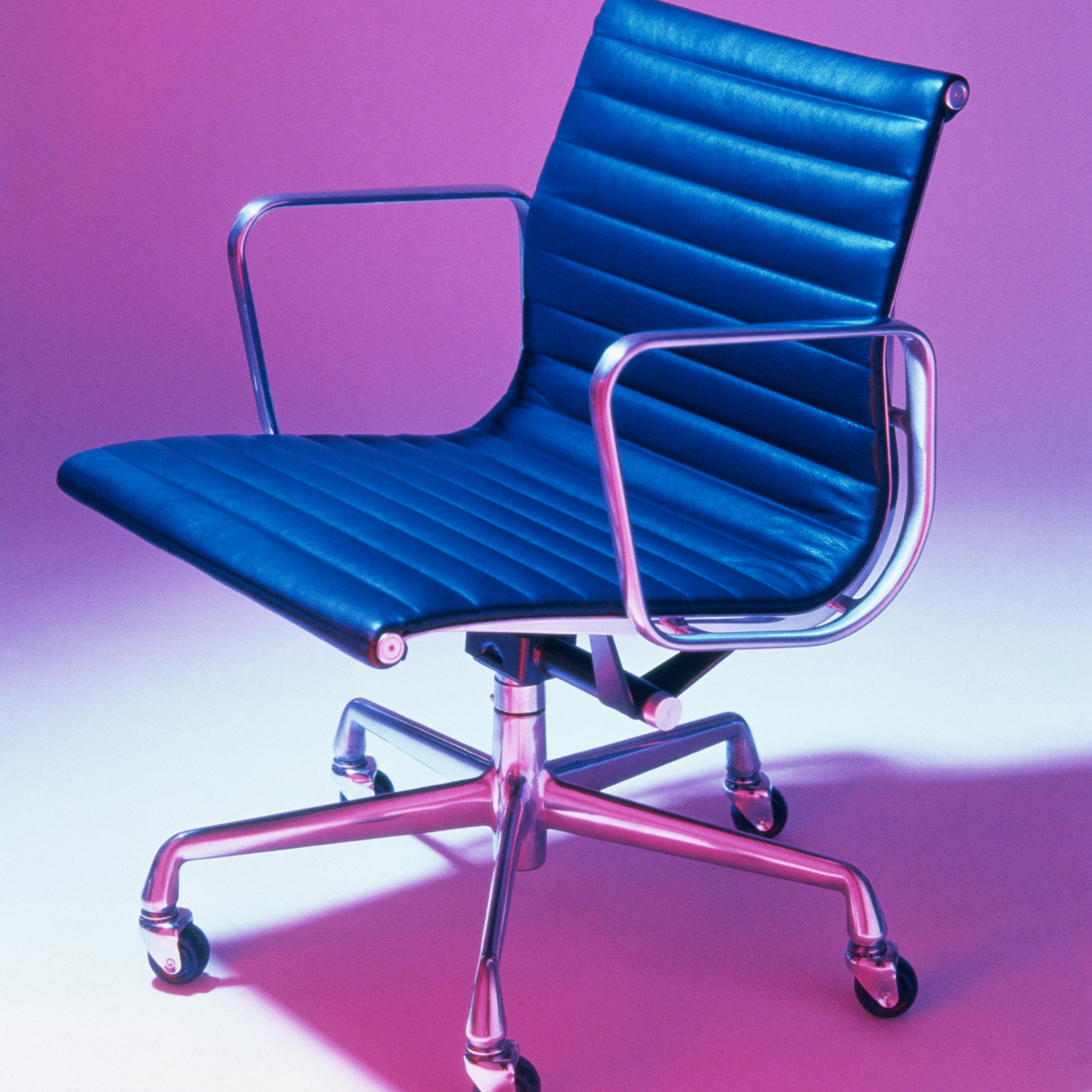 blue-office-chair-pink-background