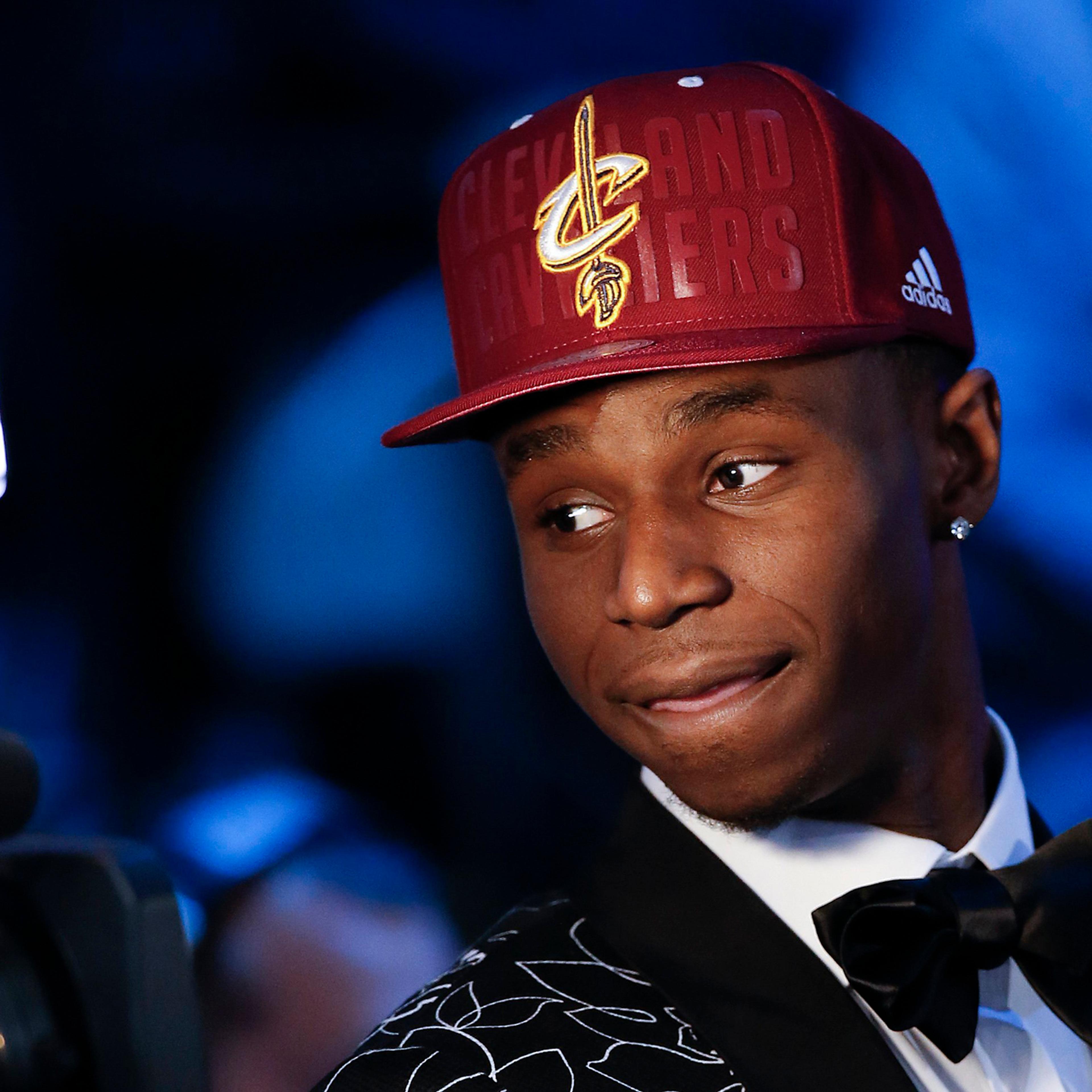 Andrew Wiggins of Kansas stops for a television interview after being selected by the Cleveland Cavaliers as the number one pick in the 2014 NBA draft, June 26, in New York.