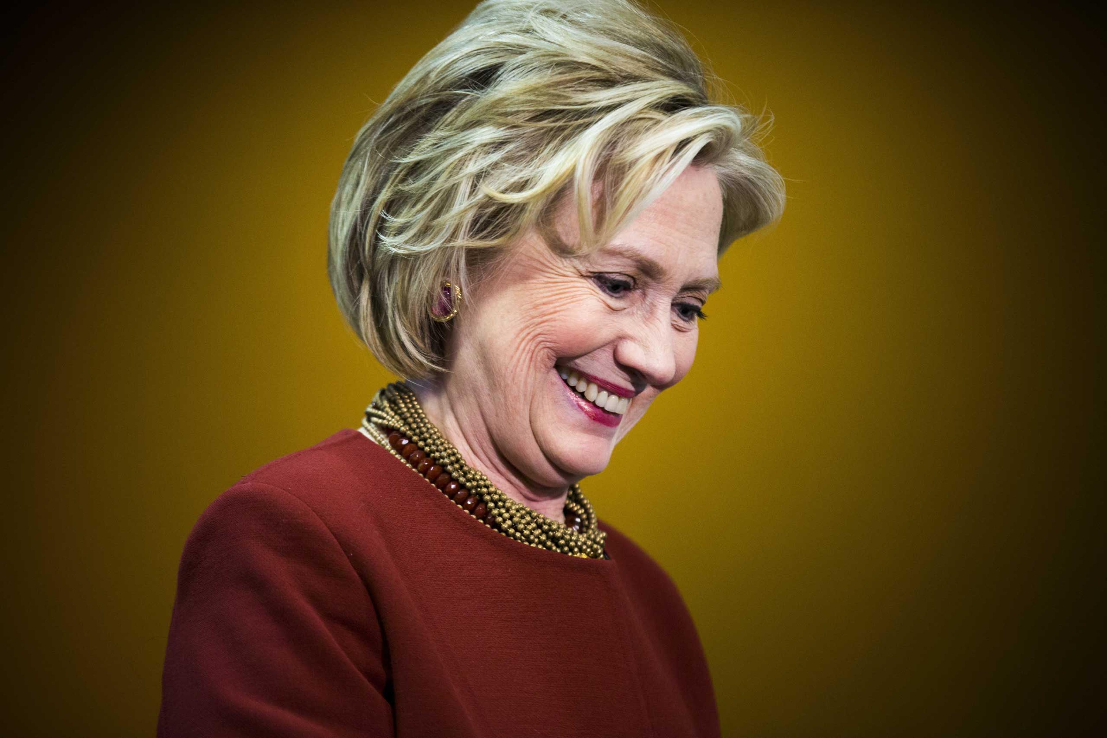 Former U.S. Secretary of State Hillary Clinton takes part in a Center for American Progress roundtable discussion on "Expanding Opportunities in America's Urban Areas" in Washington on March 23, 2015.