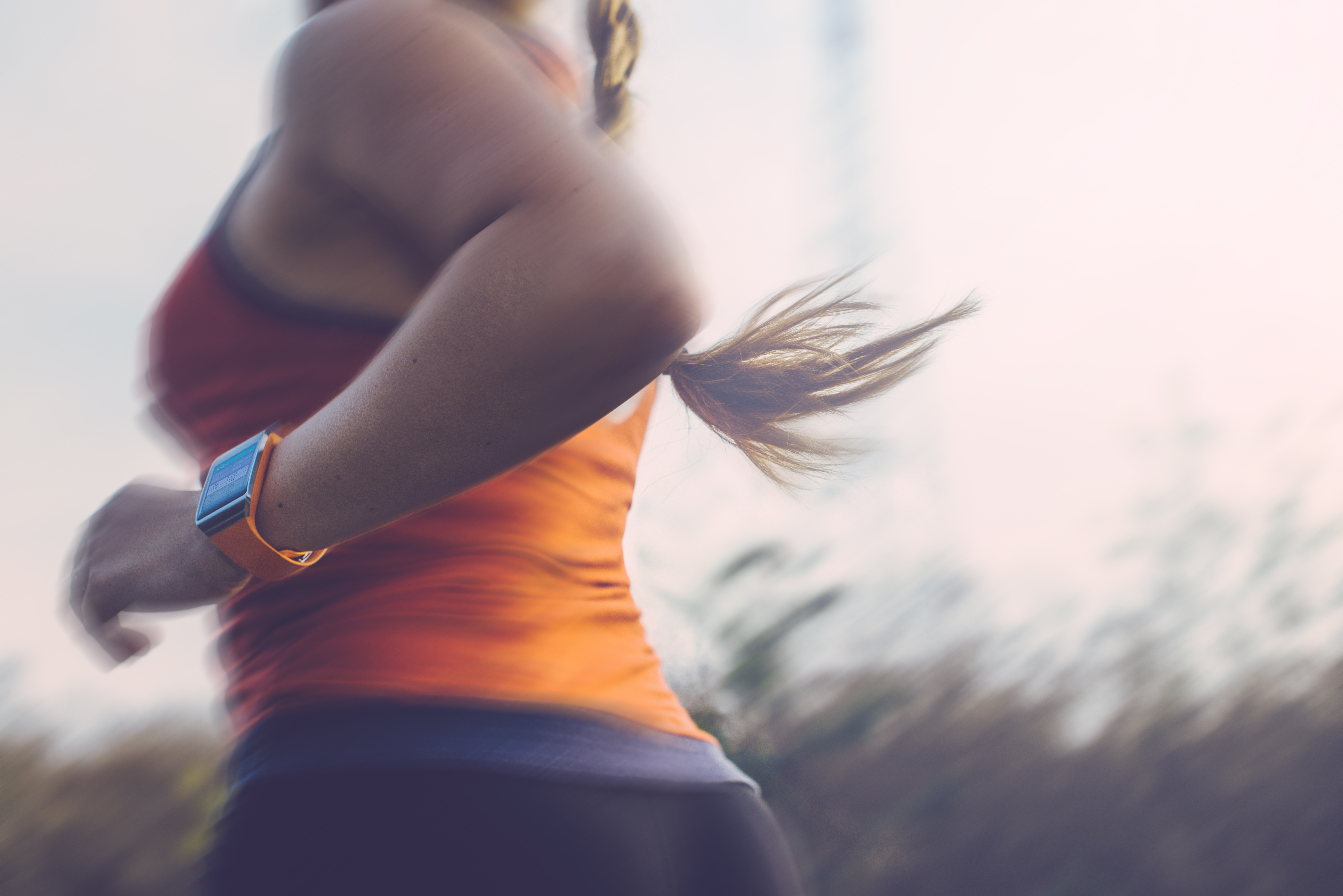 Woman running outdoor.