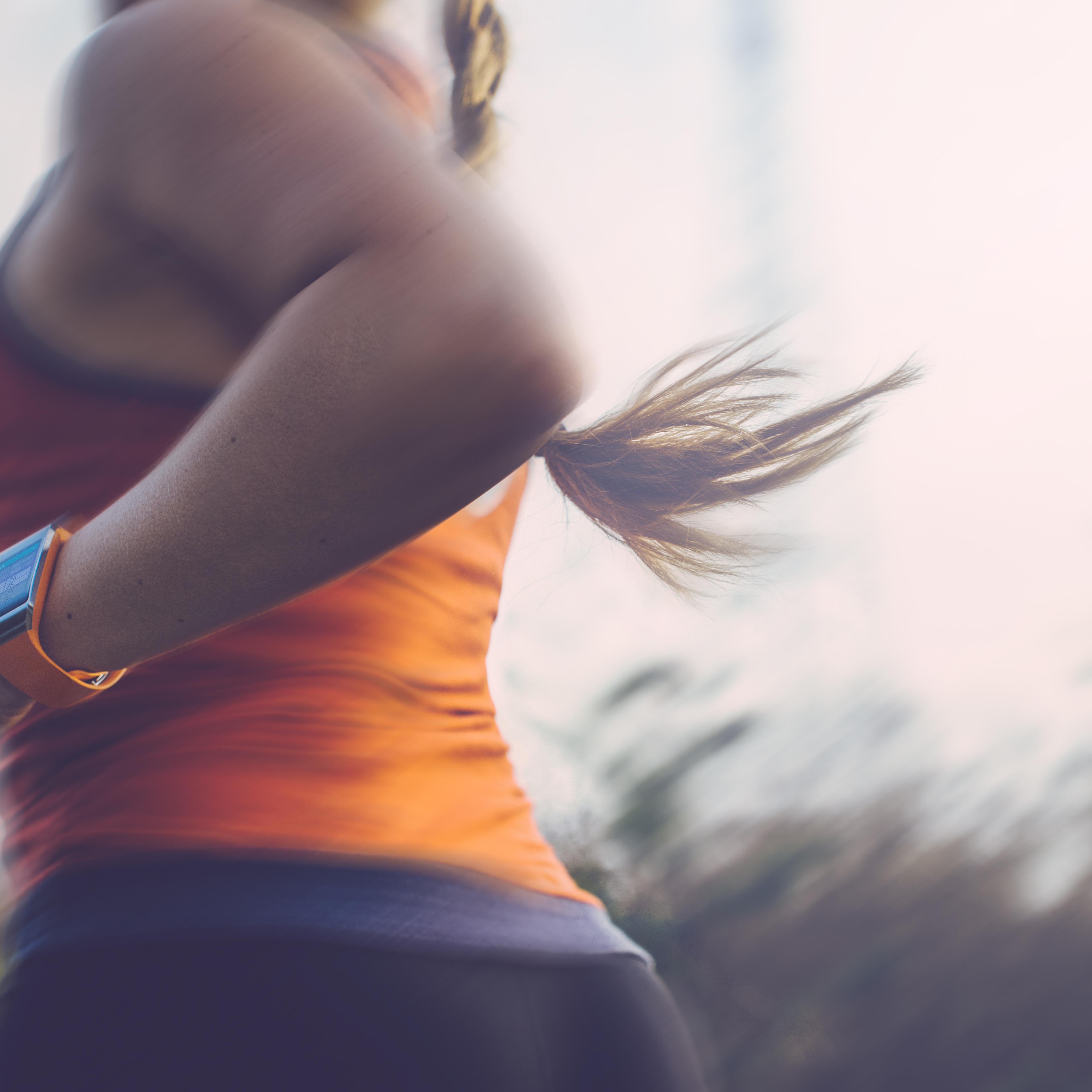 Woman running outdoor.