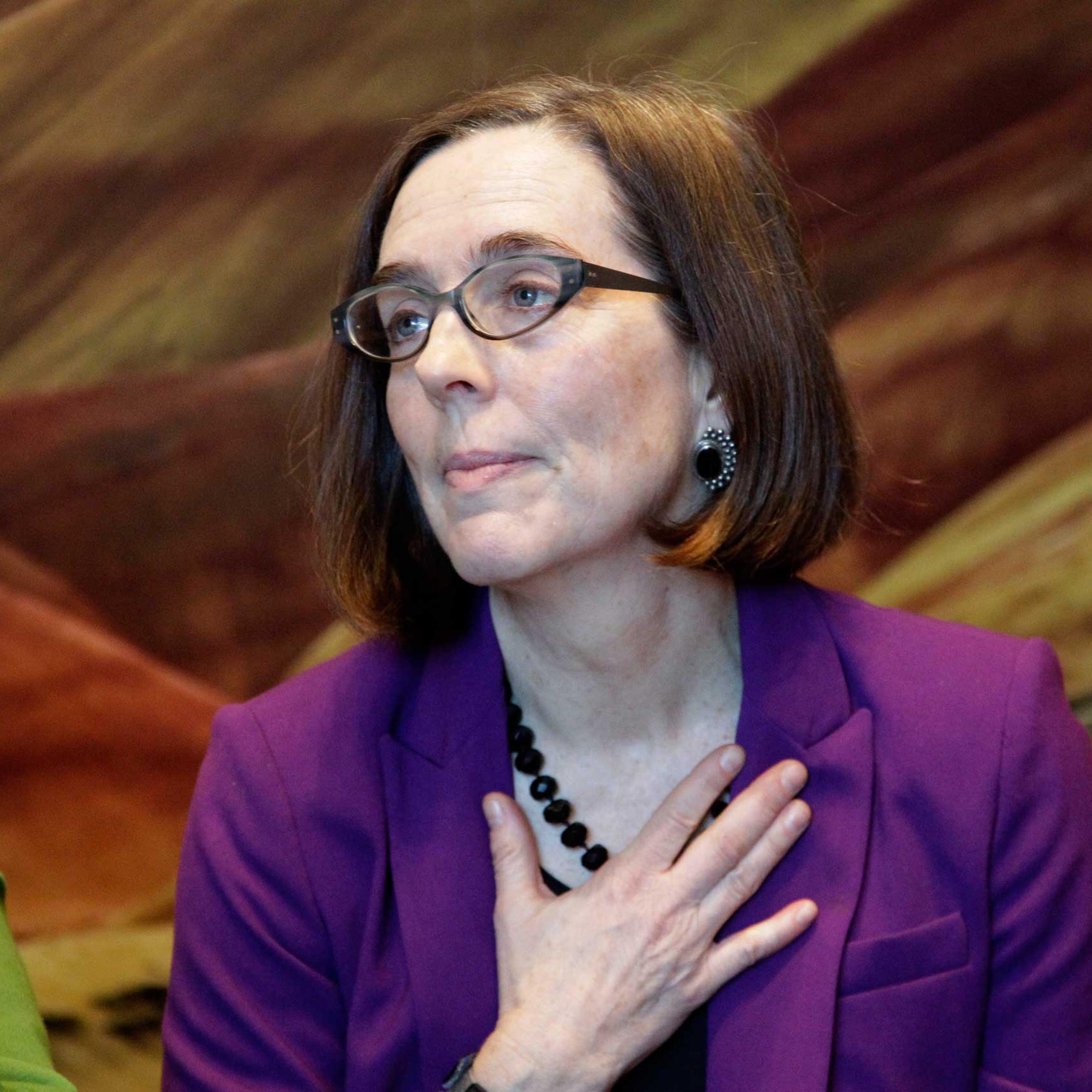 Then-Oregon Secretary of State Kate Brown is shown during a celebration at the Oregon Historical Society to mark the 156th anniversary of Oregon's admission to the union as the 33rd state in Portland, Ore., Feb. 14, 2015.