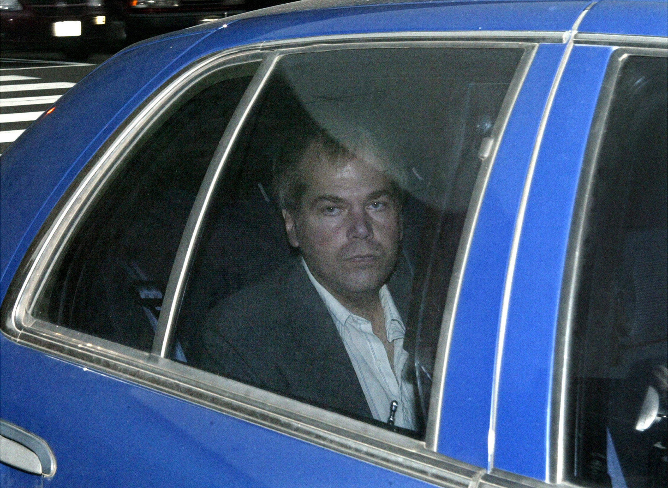 John Hinckley Jr. arrives at U.S. District Court in Washington on Nov. 18, 2003. A judge says Hinckley, who attempted to assassinate President Ronald Reagan will be allowed to leave a Washington mental hospital and live full-time in Virginia.