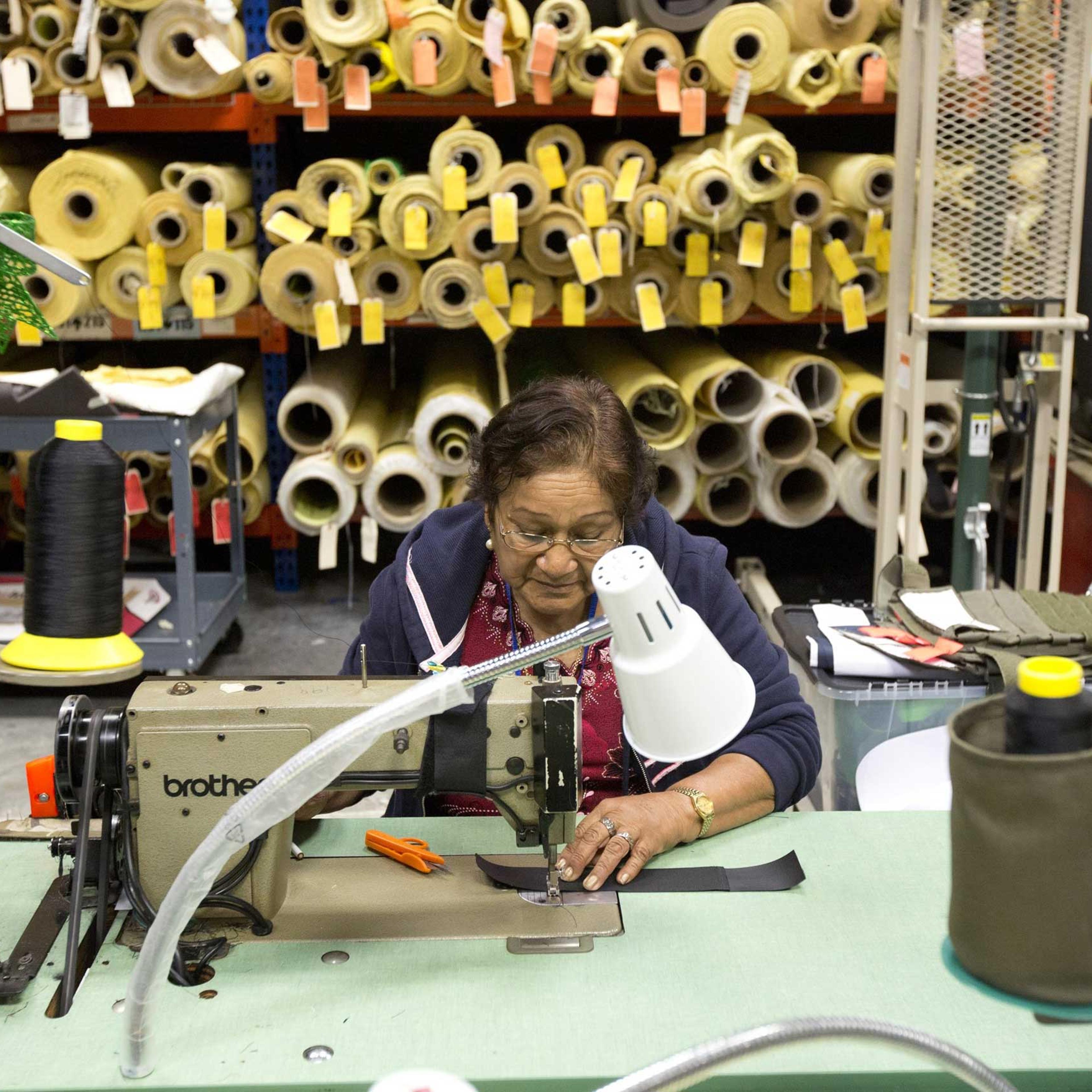 Rosa Pantoja sews a bullet proof vest together in the Research and Development department of the Point Blank Body Armor factory in Pompano Beach, Fla., Sept. 19, 2014