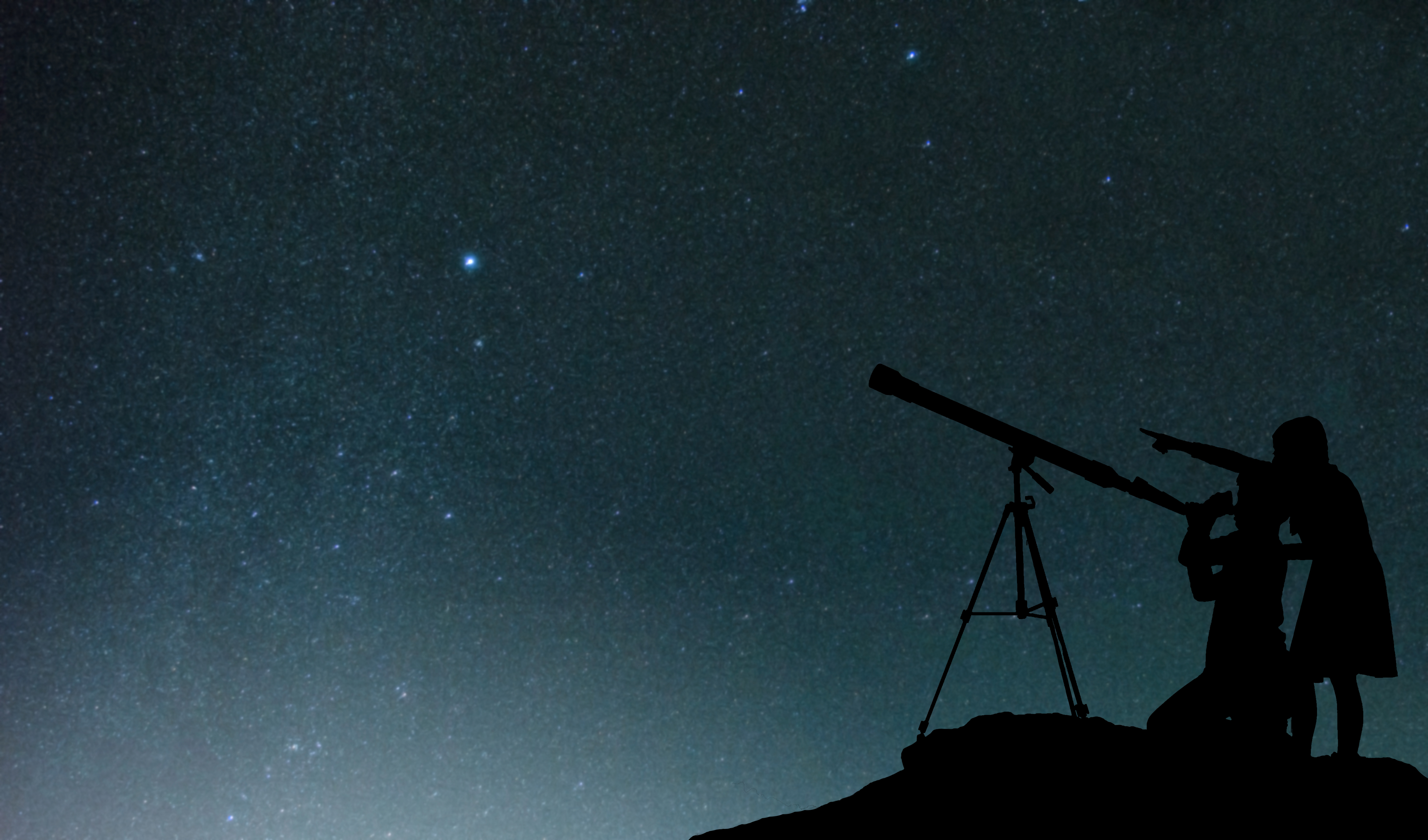 Silhouette Friends Using Telescope Against Star Field At Night