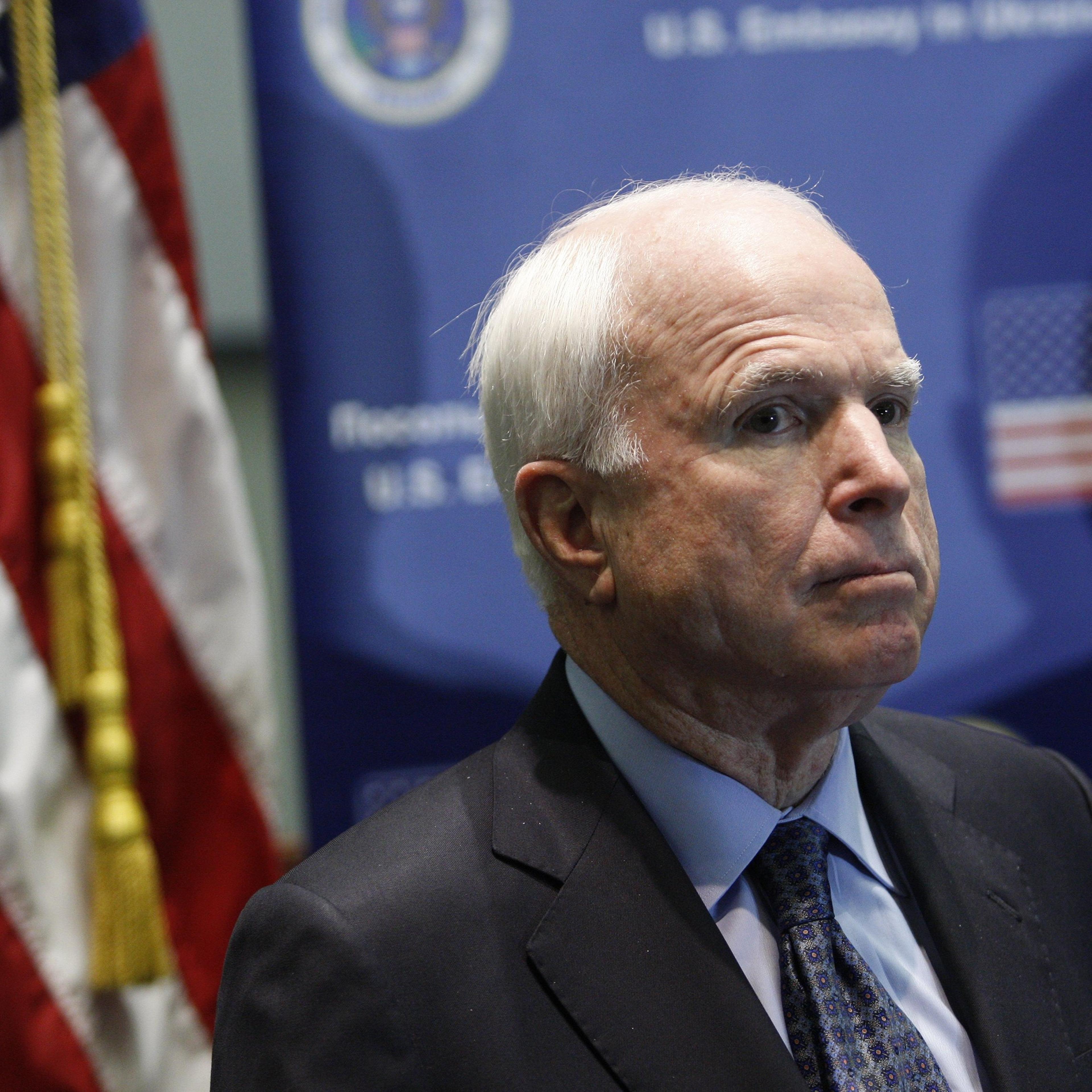 Senator John McCain speaks at a news conference in Kiev