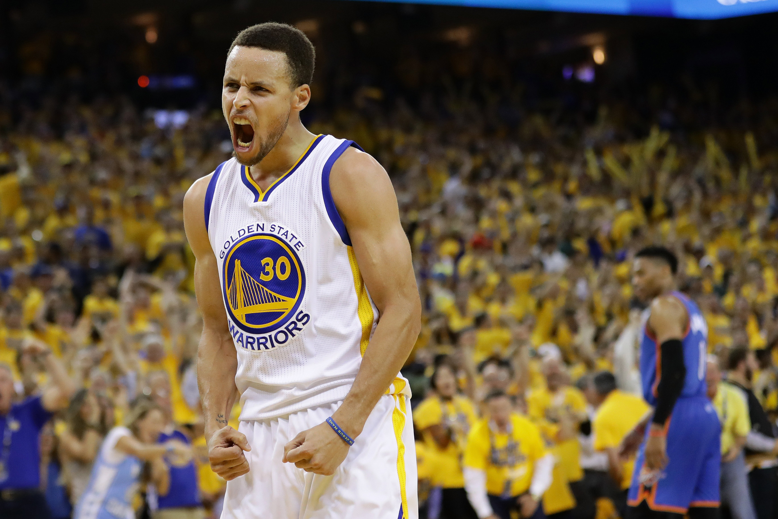 Stephen Curry of the Golden State Warriors reacts in the third quarter of Game Seven of the Western Conference Finals against the Oklahoma City Thunder during the 2016 NBA Playoffs in Oakland, Calif. on May 30, 2016.