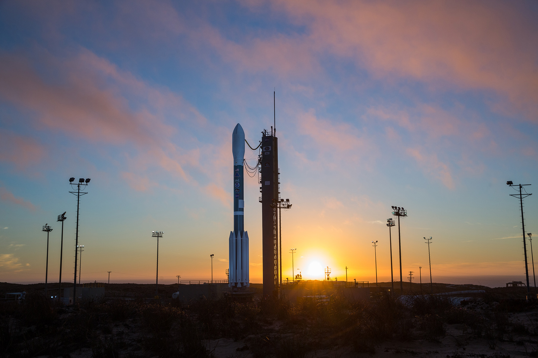 A ULA Delta II rocket carrying the JPSS-1 mission for NASA and NOAA stands poised for launch.