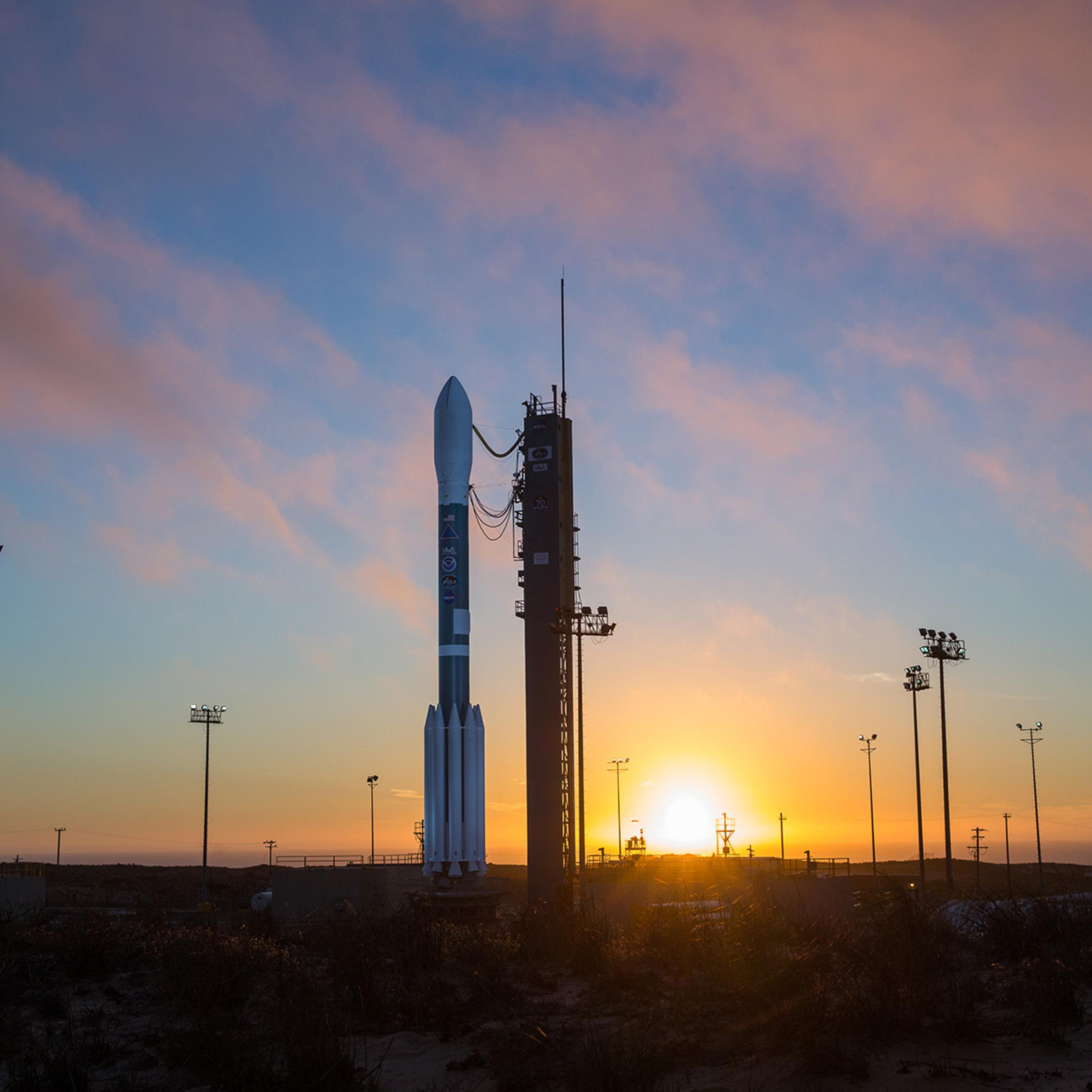 A ULA Delta II rocket carrying the JPSS-1 mission for NASA and NOAA stands poised for launch.