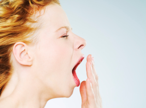 woman-yawning-side-view