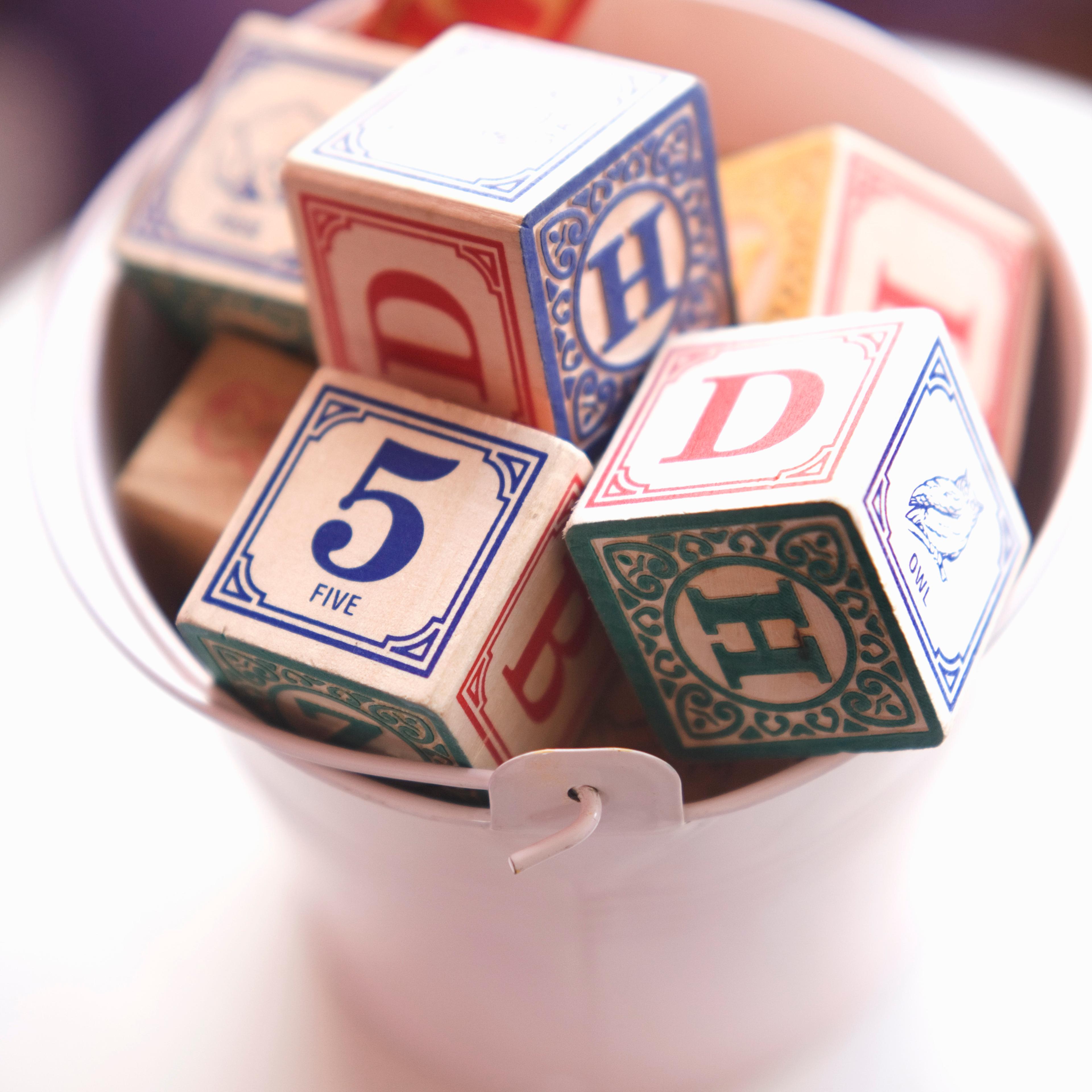 Toy blocks in pail
