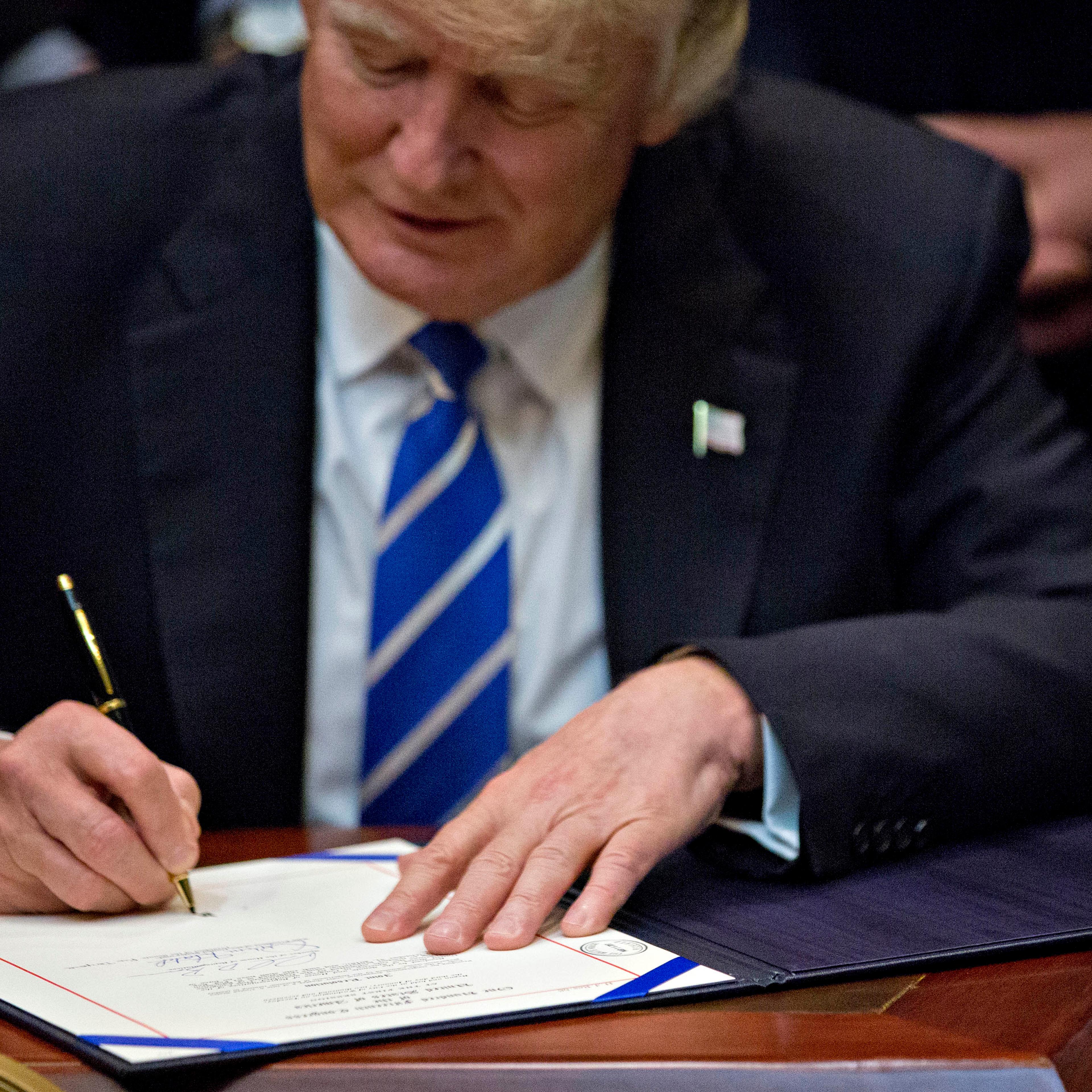 President Trump Signs Bills That Nullify Measures Put In Place During Obama Presidency