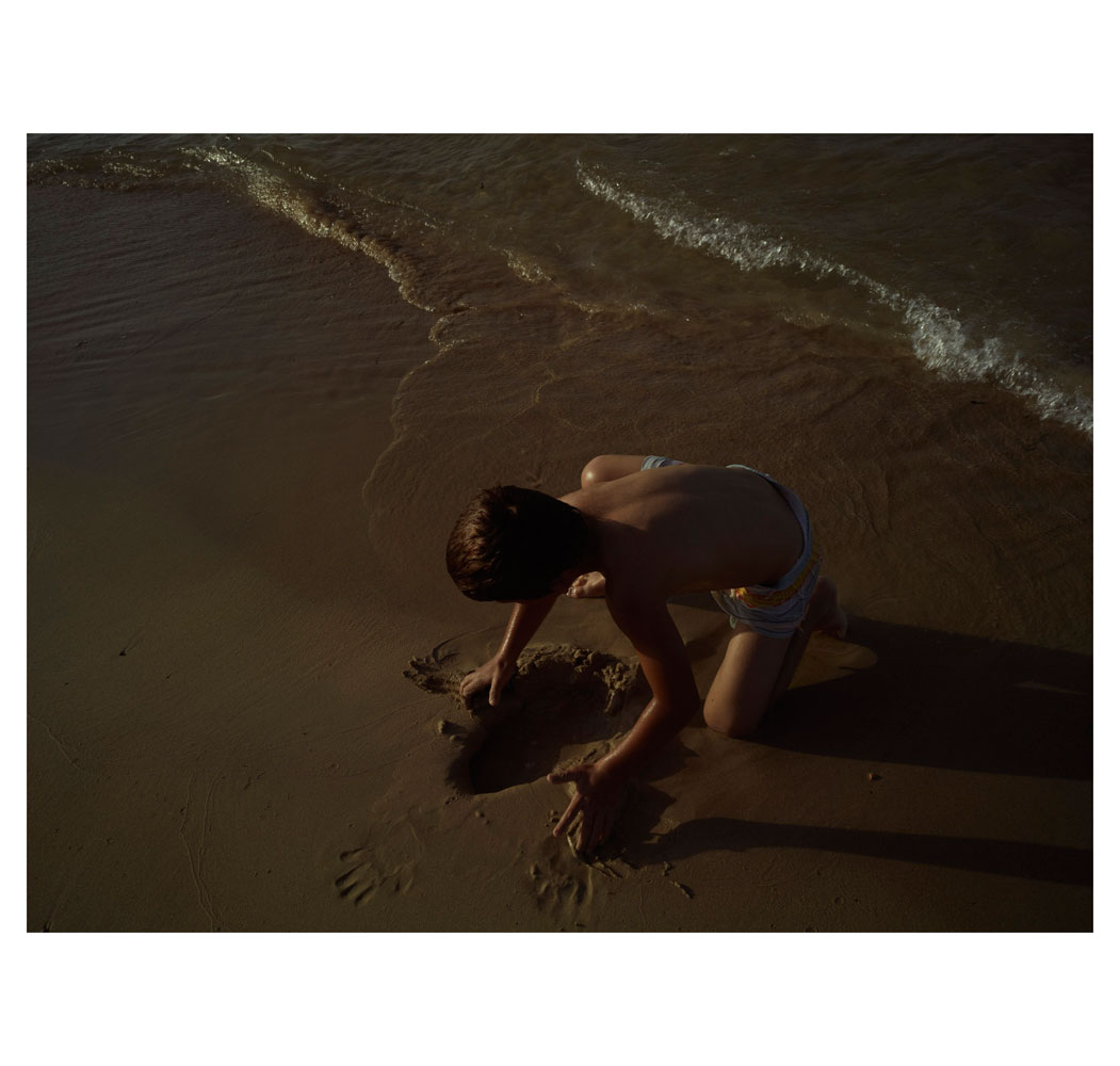Boy on the shore.