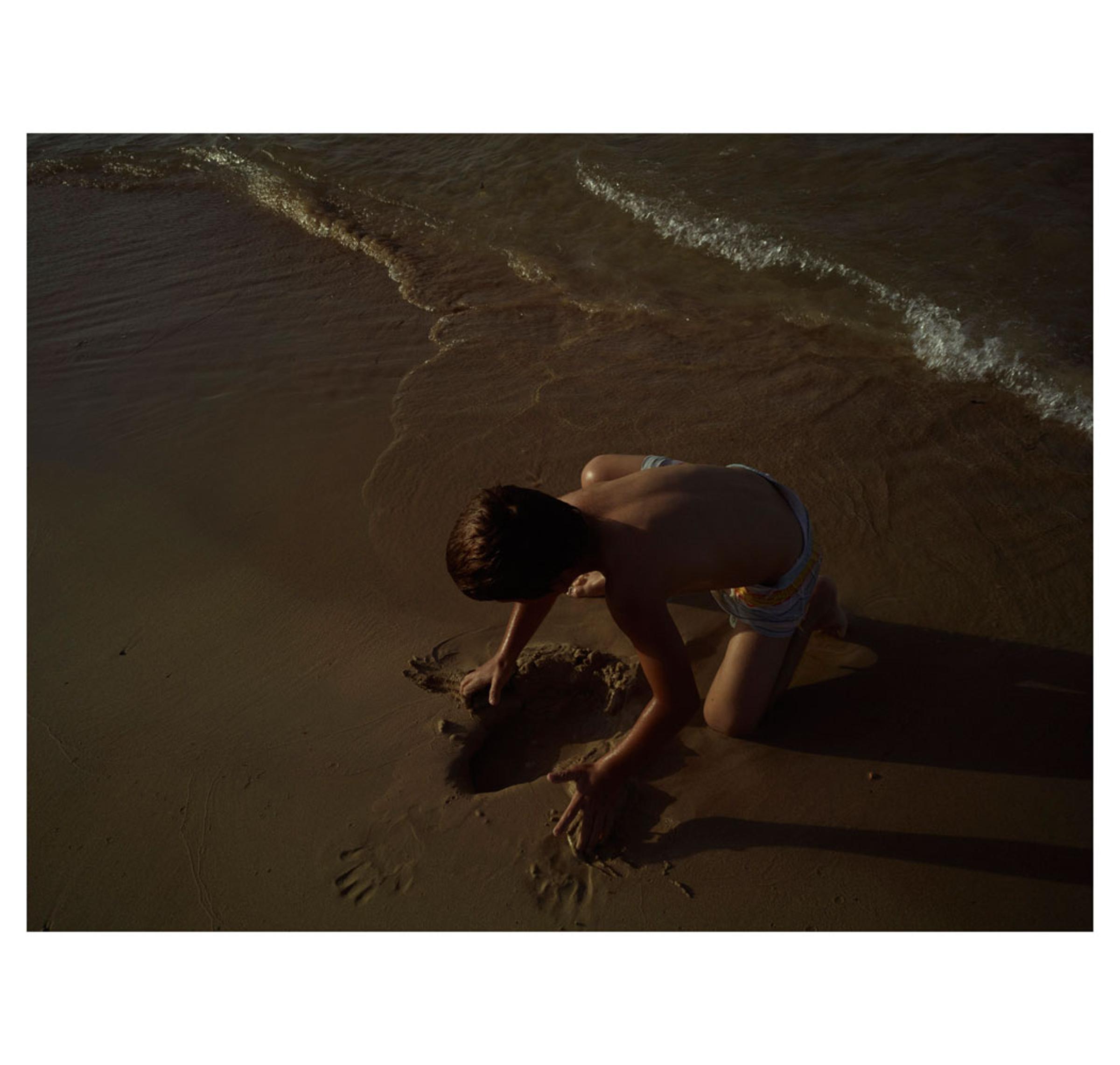 Boy on the shore.