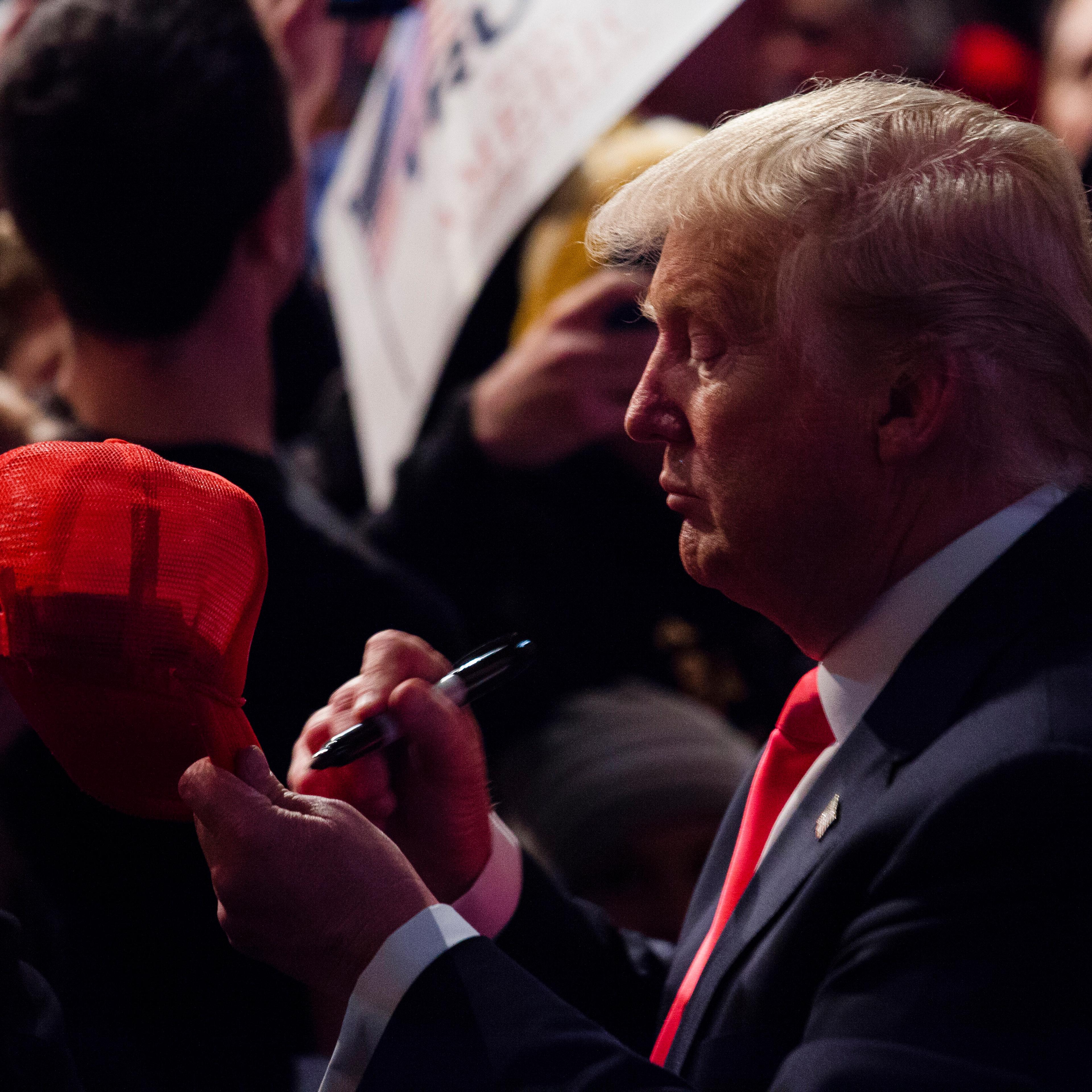 Donald Trump greets the crowd after speaking to supporters at a campaign stop on April 4, 2016 in Milwaukee, Wisconsin.