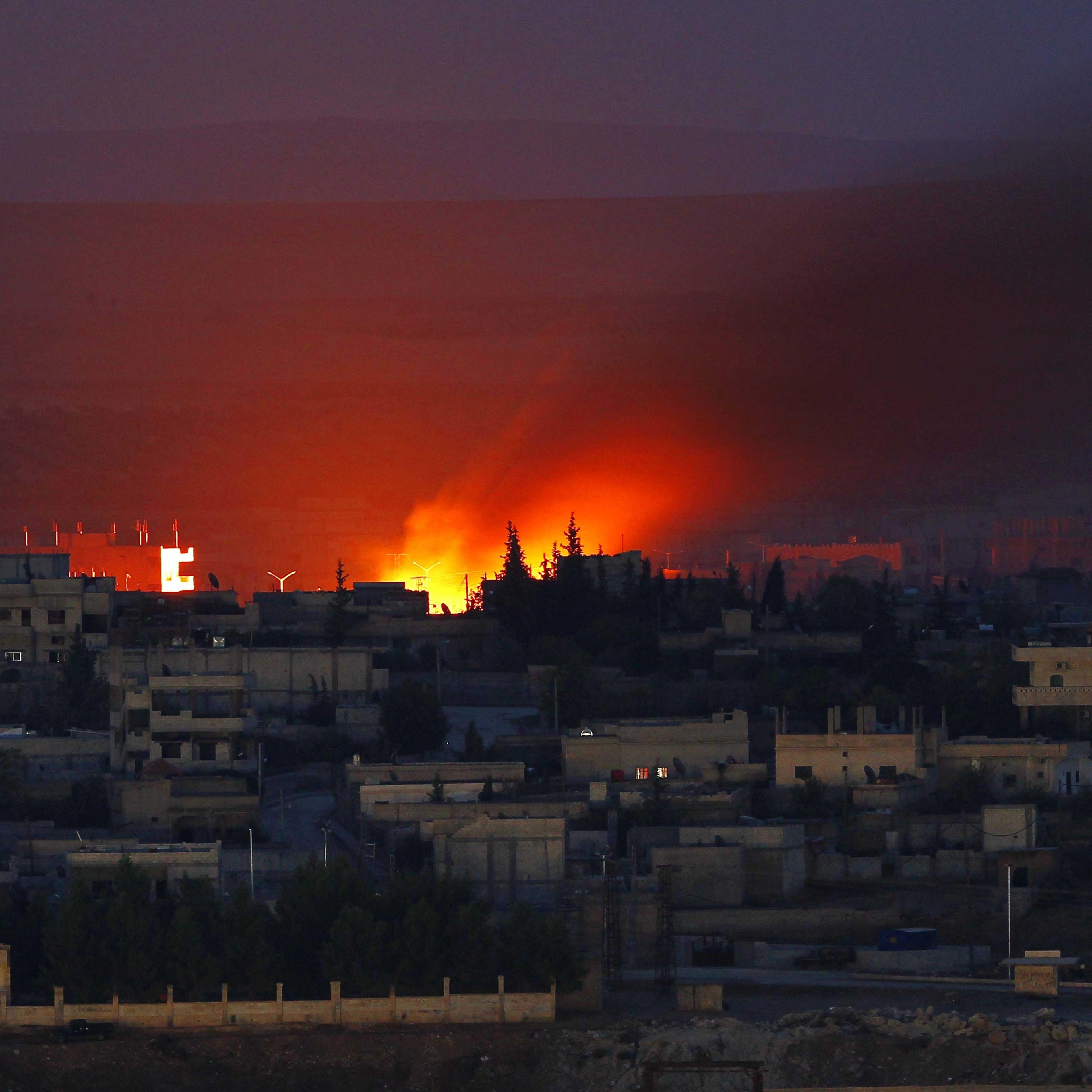 Fire is seen after an US airstrike on ISIS positions in Kobani, Syria, on Oct. 15, 2014.