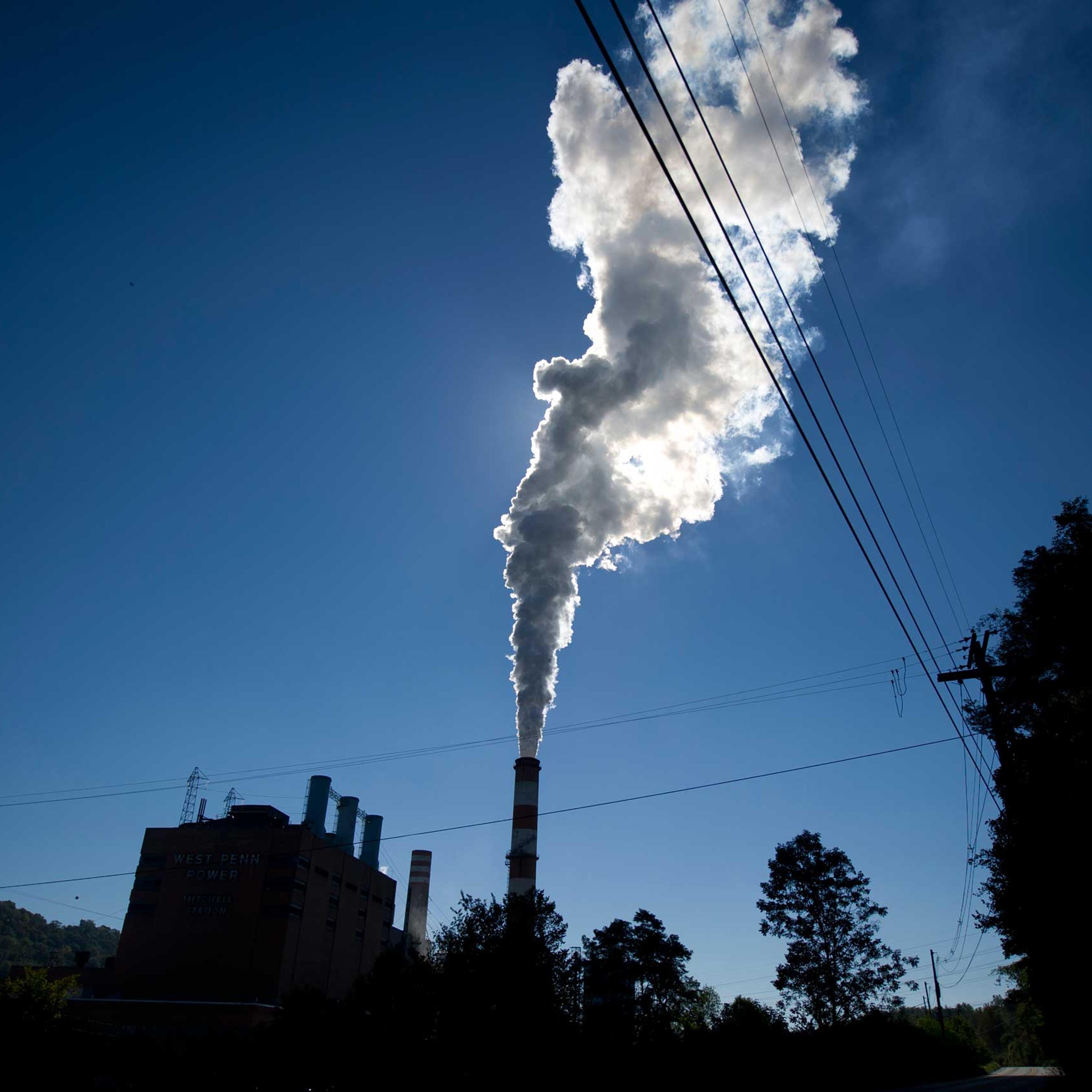 A plume of exhaust extends from the Mitchell Power Station, a coal-fired power plant located 20 miles southwest of Pittsburgh, on Sept. 24, 2013 in New Eagle, Pa.