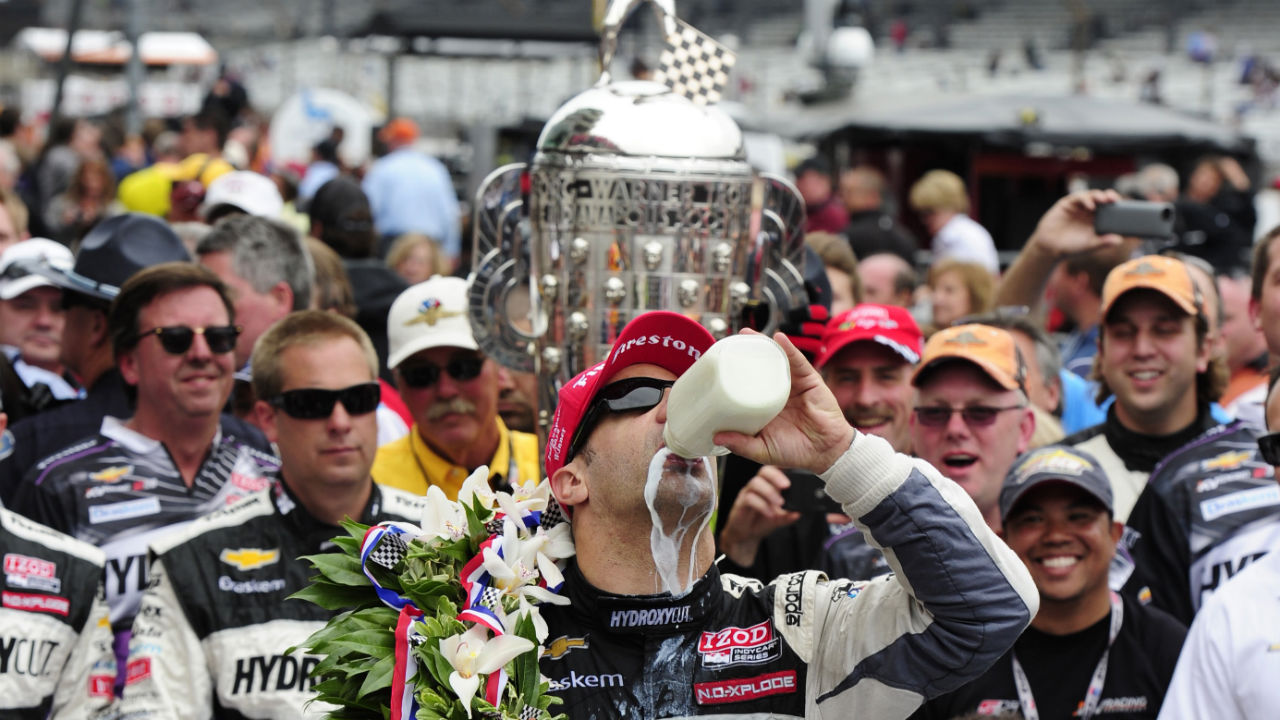 Tony Kanaan of Brazil driver of the #11 KV Racing Technology Dallara Chevrolet celebrates after winning the IZOD IndyCar Series 97th running of the Indianapolis 500 mile race at the Indianapolis Motor Speedway on May 26, 2013 in Indianapolis, Indiana.
