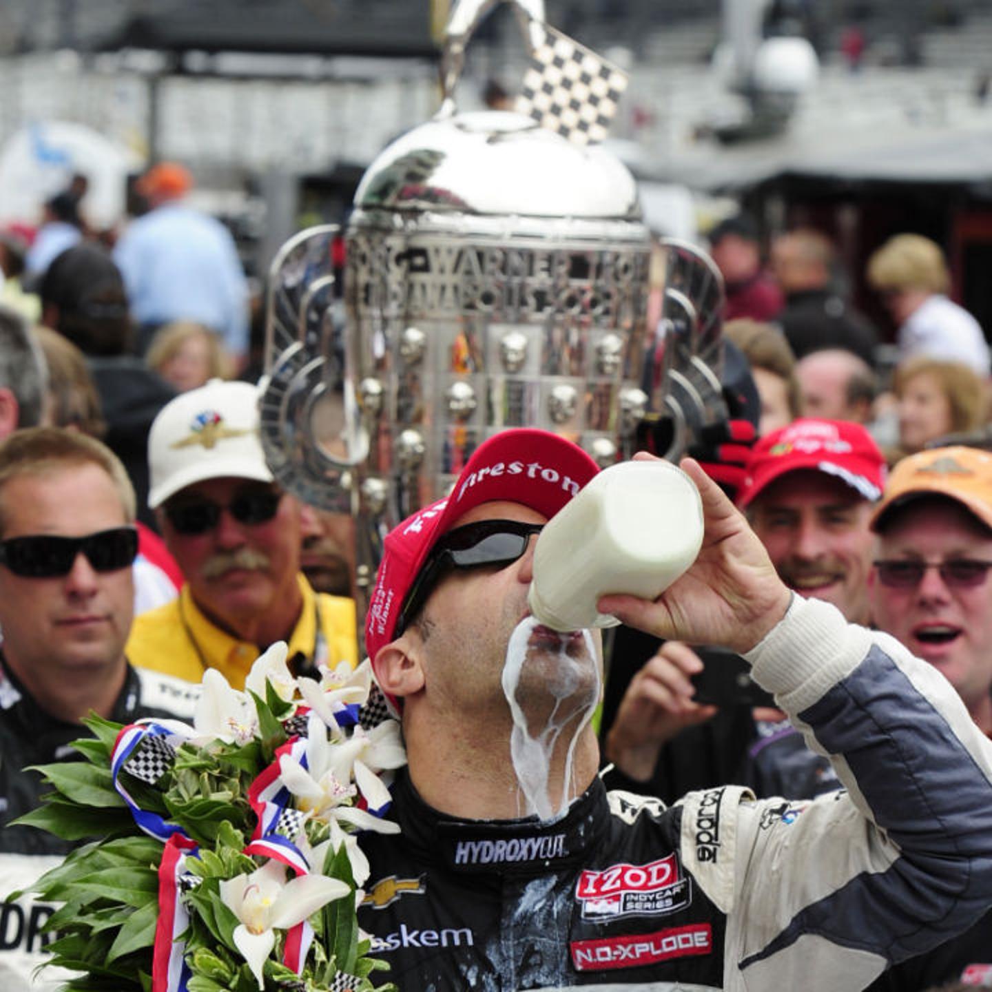 Tony Kanaan of Brazil driver of the #11 KV Racing Technology Dallara Chevrolet celebrates after winning the IZOD IndyCar Series 97th running of the Indianapolis 500 mile race at the Indianapolis Motor Speedway on May 26, 2013 in Indianapolis, Indiana.