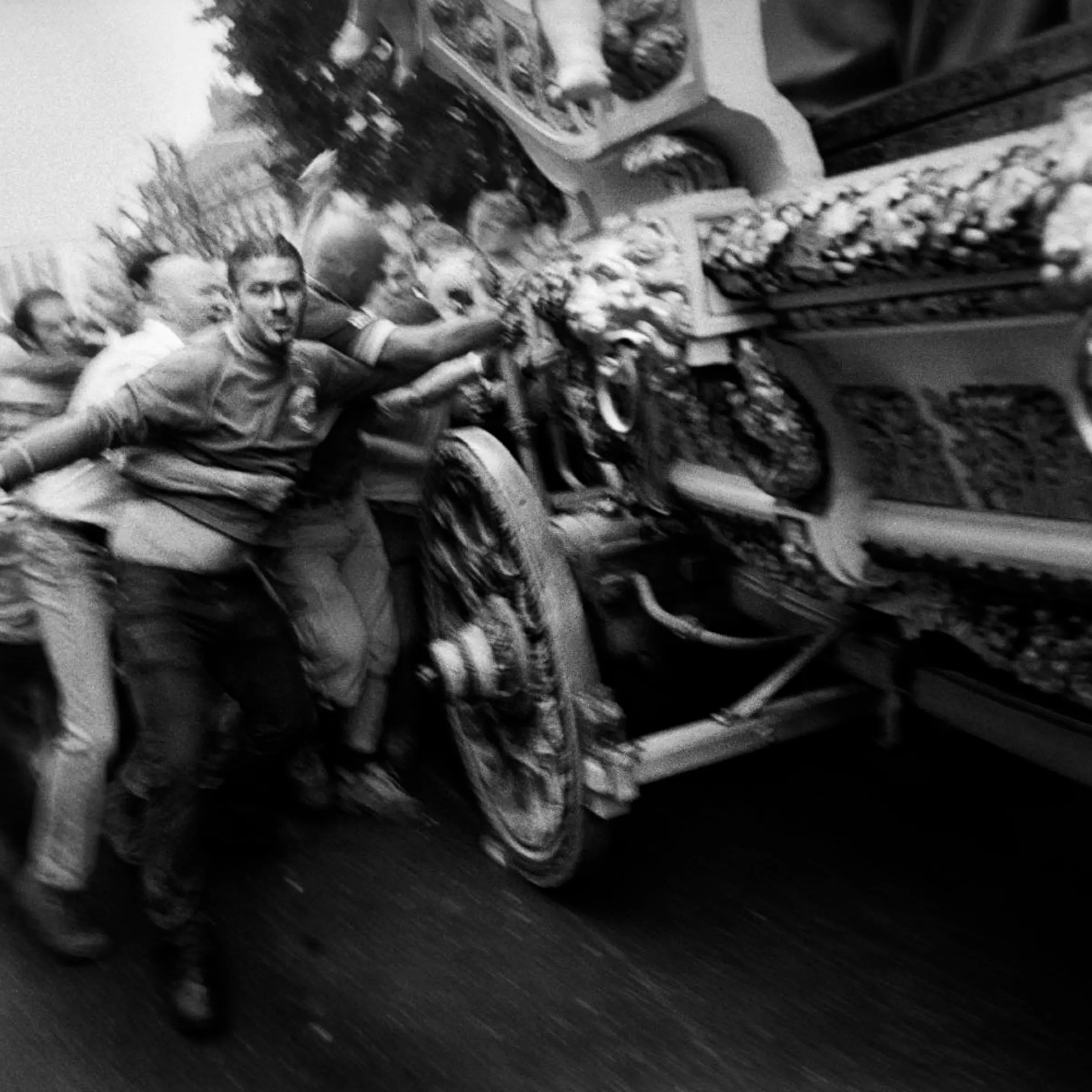 The Ritual of the Golden Car ascent during the Ducasse de Mons festival.