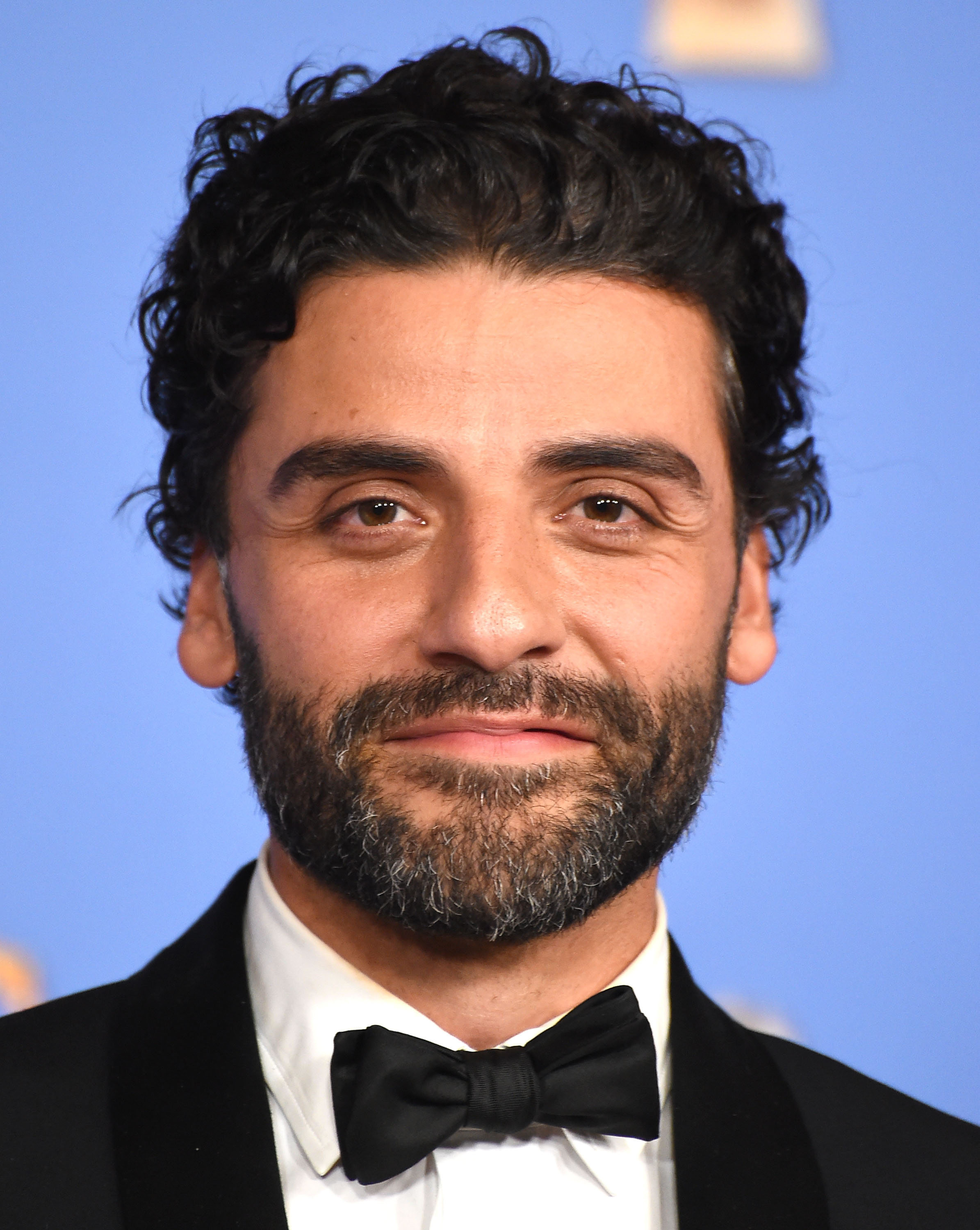 Oscar Isaac poses at the 73rd Annual Golden Globe Awards on January 10, 2016 in Beverly Hills, California.