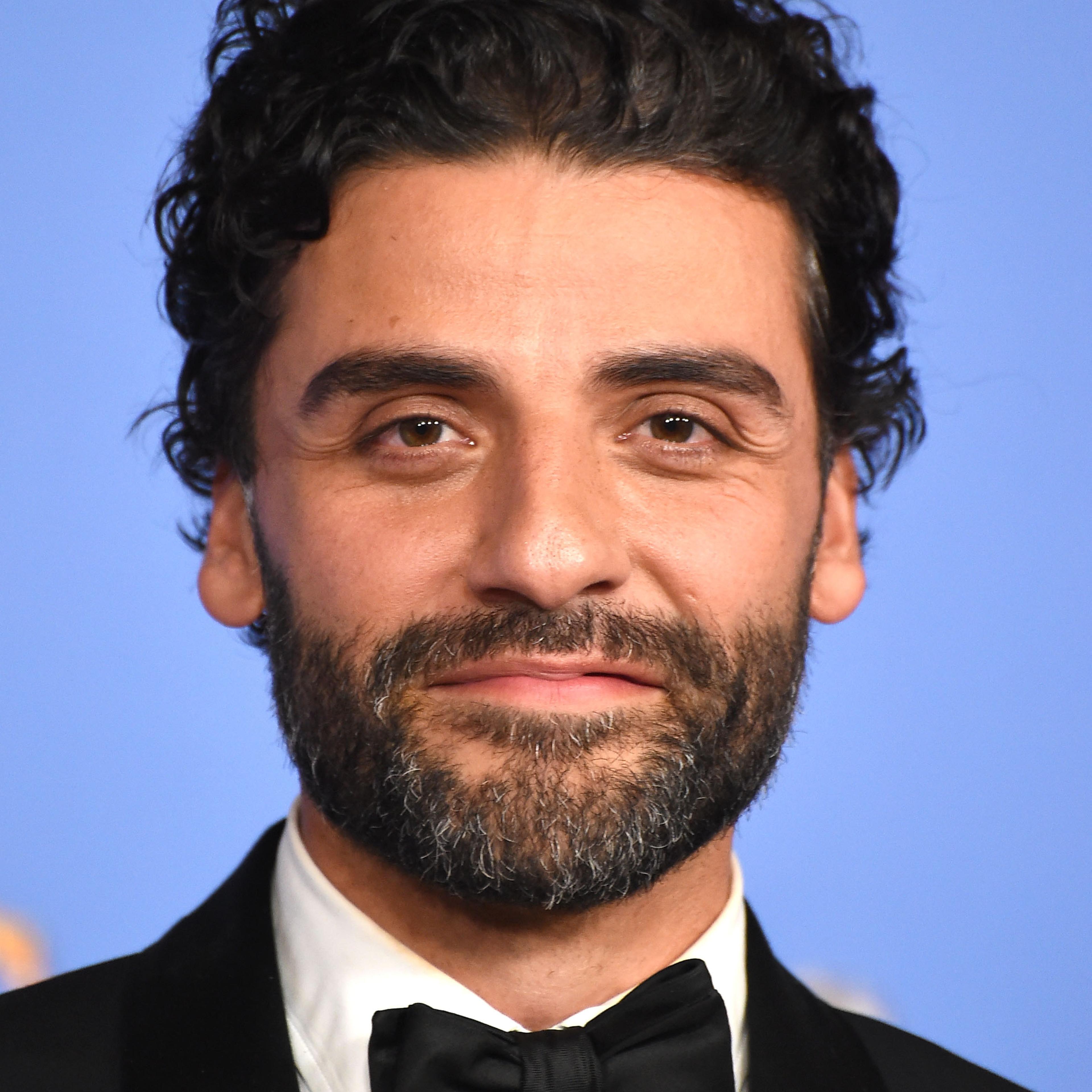 Oscar Isaac poses at the 73rd Annual Golden Globe Awards on January 10, 2016 in Beverly Hills, California.