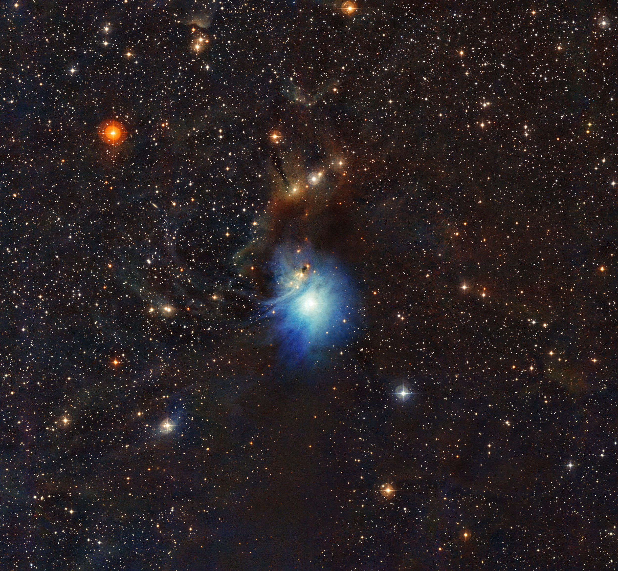 A newly formed star lights up the surrounding cosmic clouds in this image from ESO’s La Silla Observatory in Chile. Dust particles in the vast clouds that surround the star HD 97300 diffuse its light, like a car headlight in enveloping fog, and create th