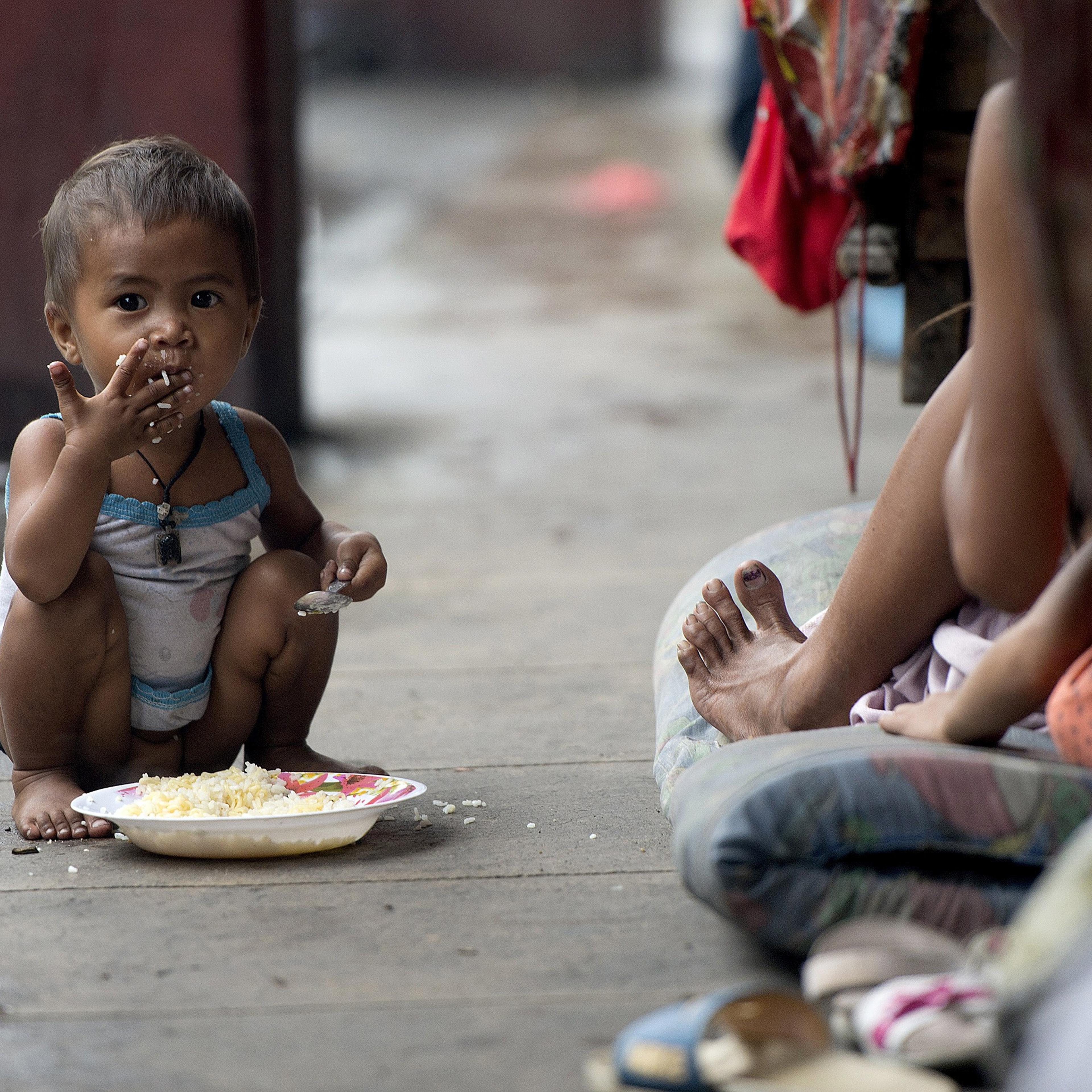 A homeless child in the streets of Manila in 2014.