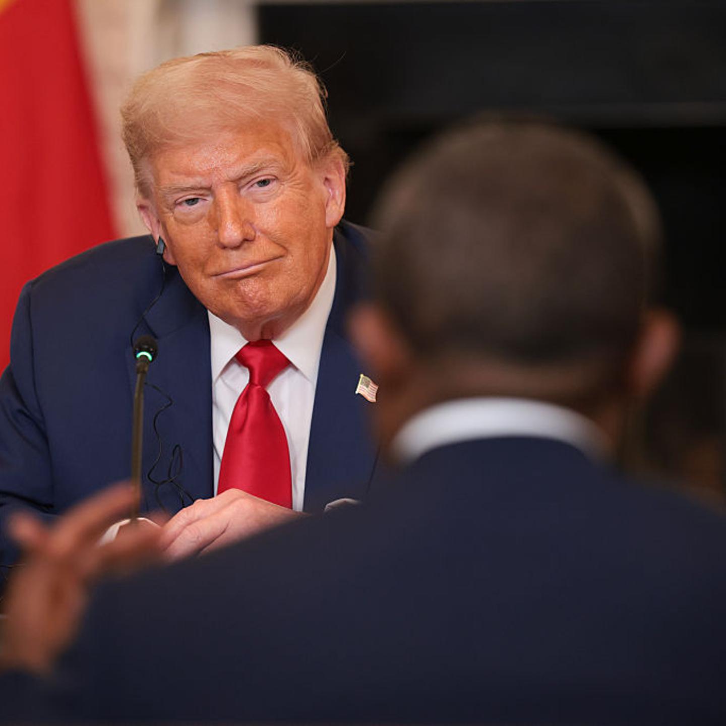 U.S. President Donald Trump listens during a multilateral lunch with African leaders in the State Dining Room of the White House in Washington, D.C. on July 9, 2025.