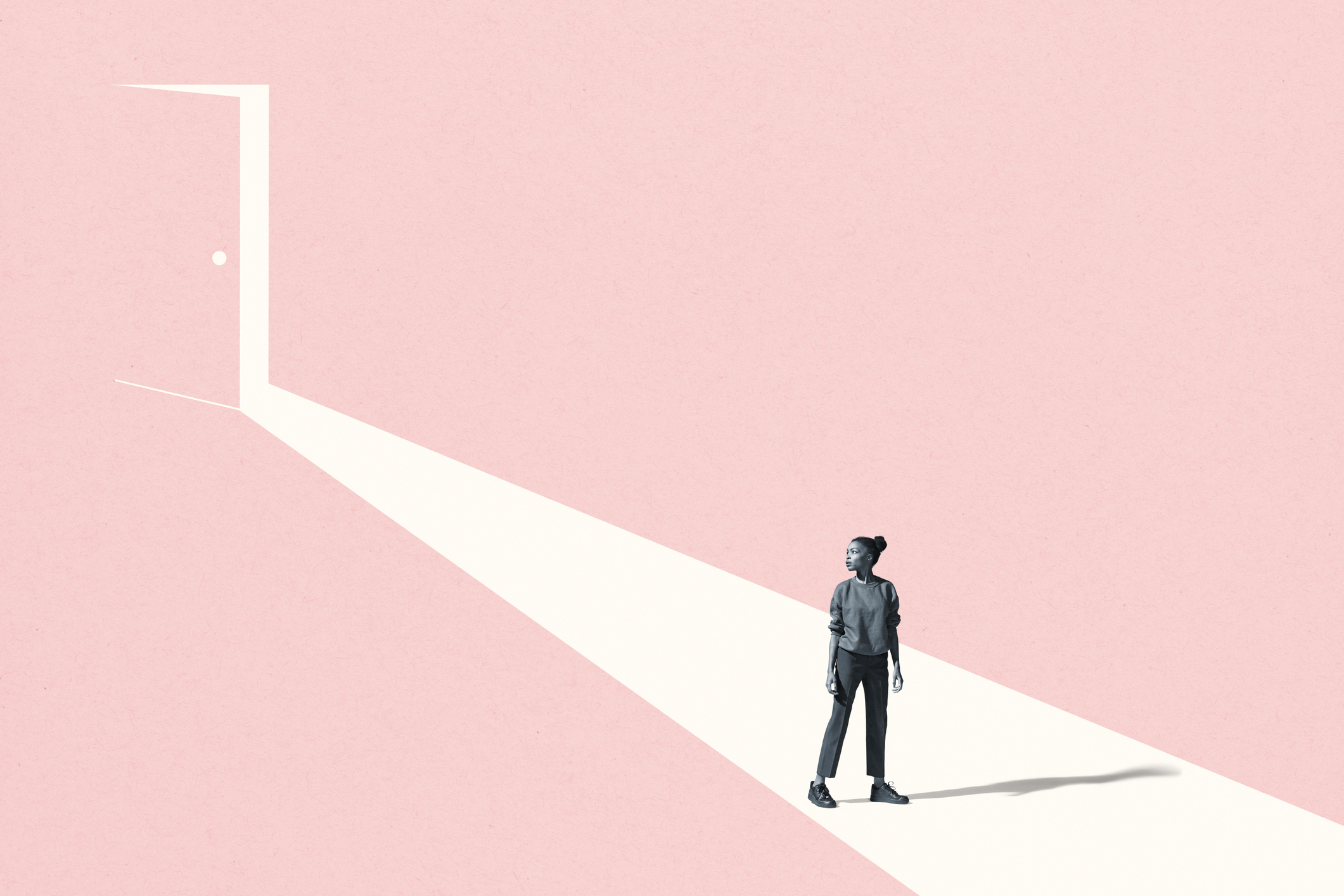 Young woman looking away against pink door