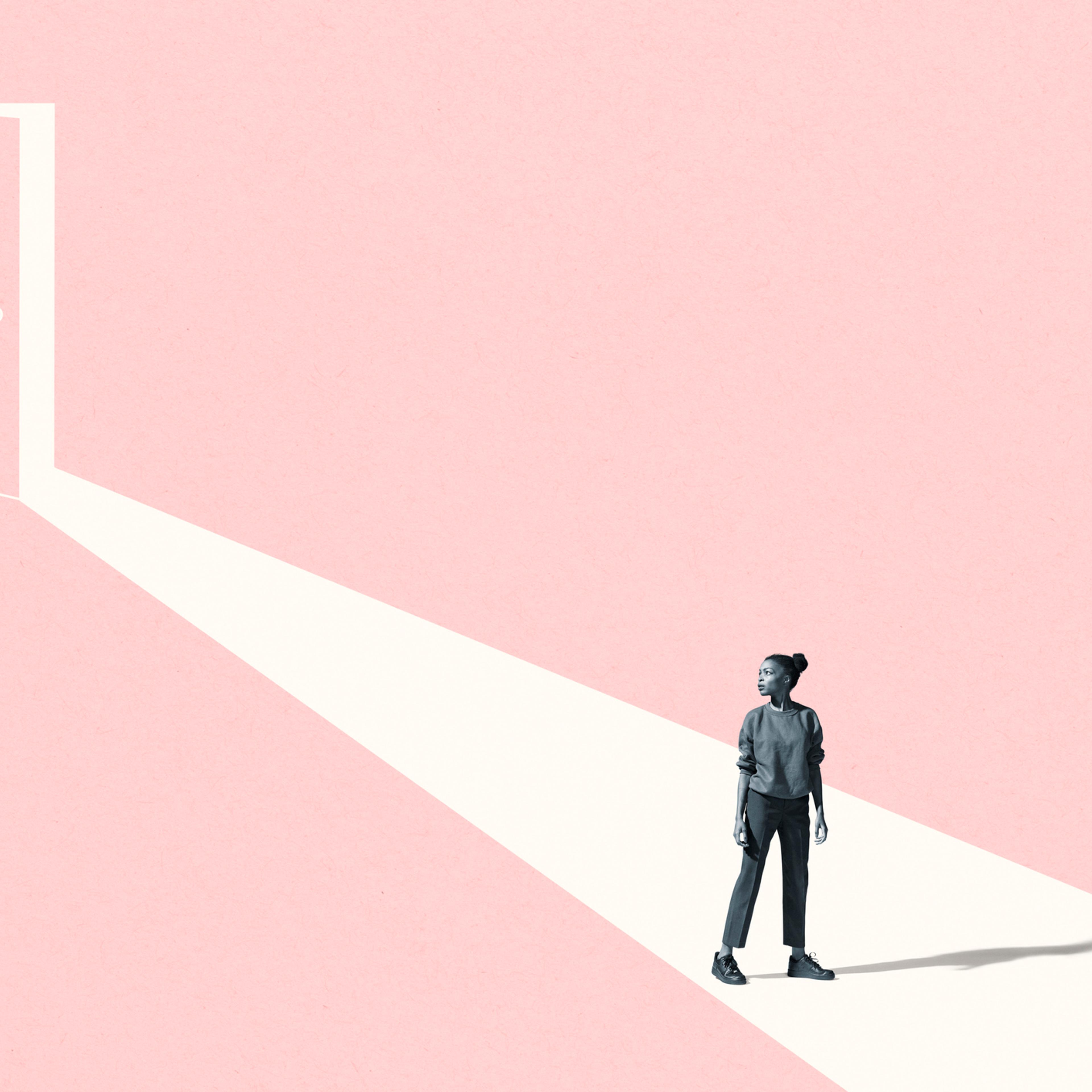 Young woman looking away against pink door
