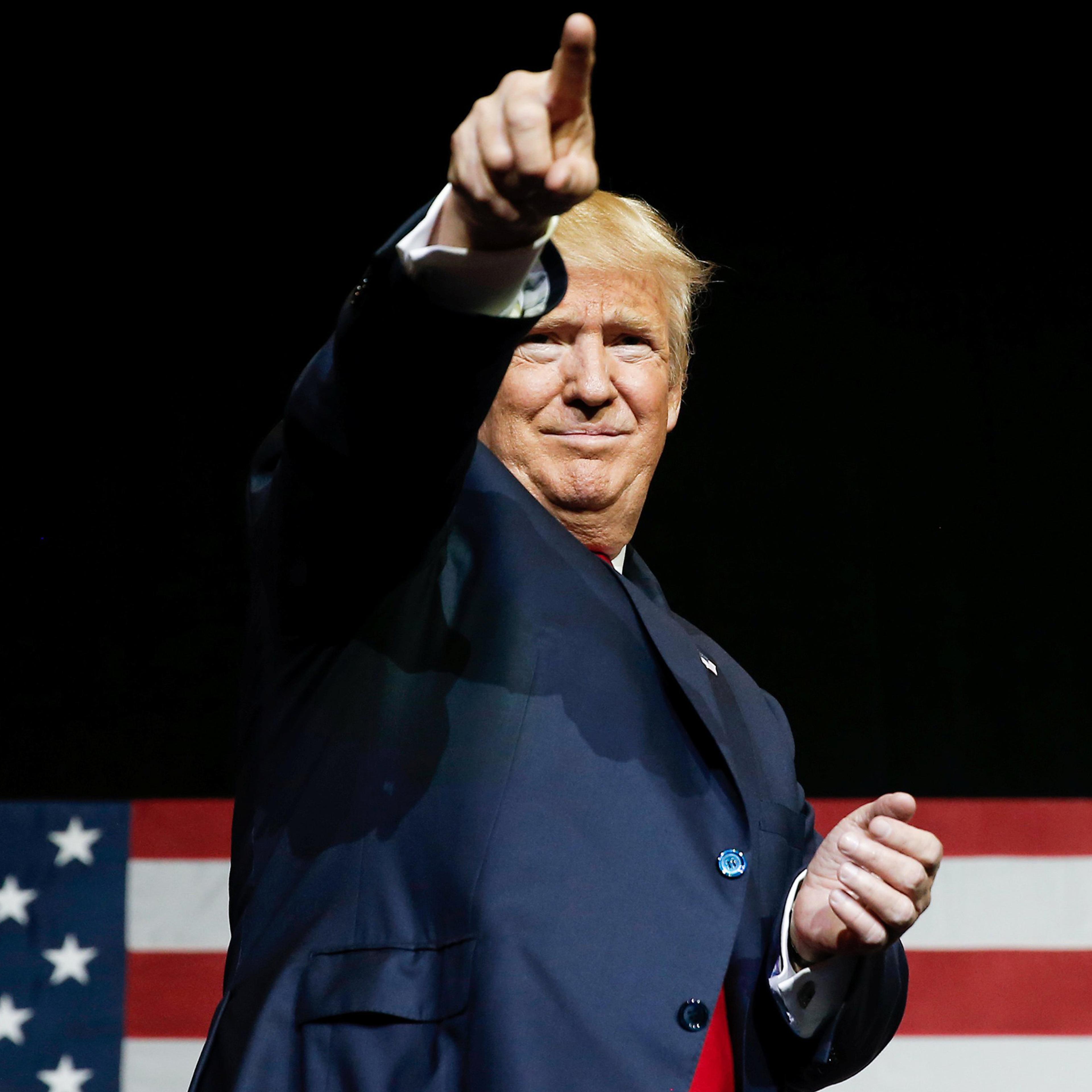 Republican U.S. presidential nominee Donald Trump gestures at a campaign rally in West Palm Beach