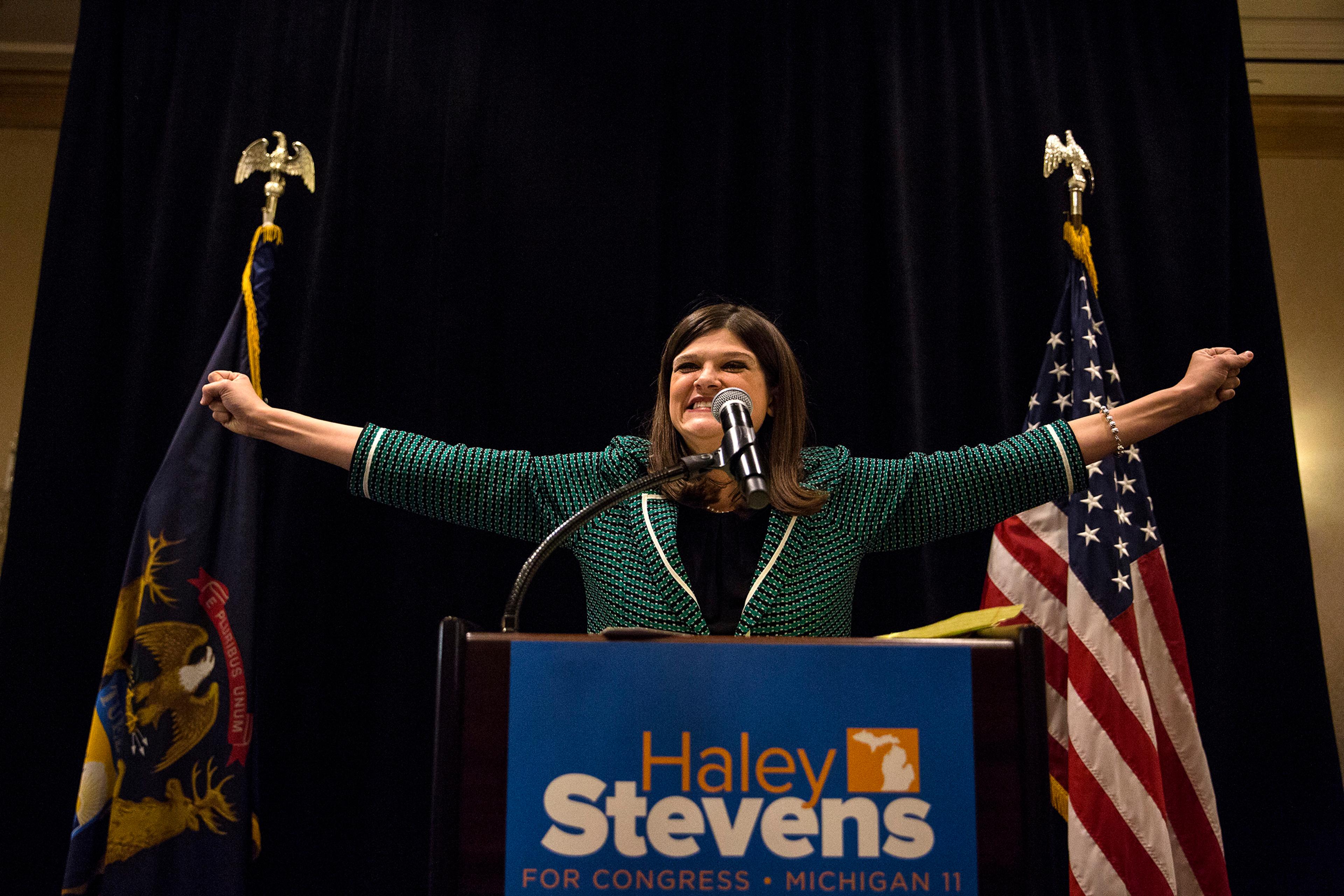 Democratic candidate and winner of Michigan's 11th Congressional District Haley Stevens addresses the crowd at the Townsend Hotel in Birmingham, Mich. on Tuesday, Nov. 6, 2018.