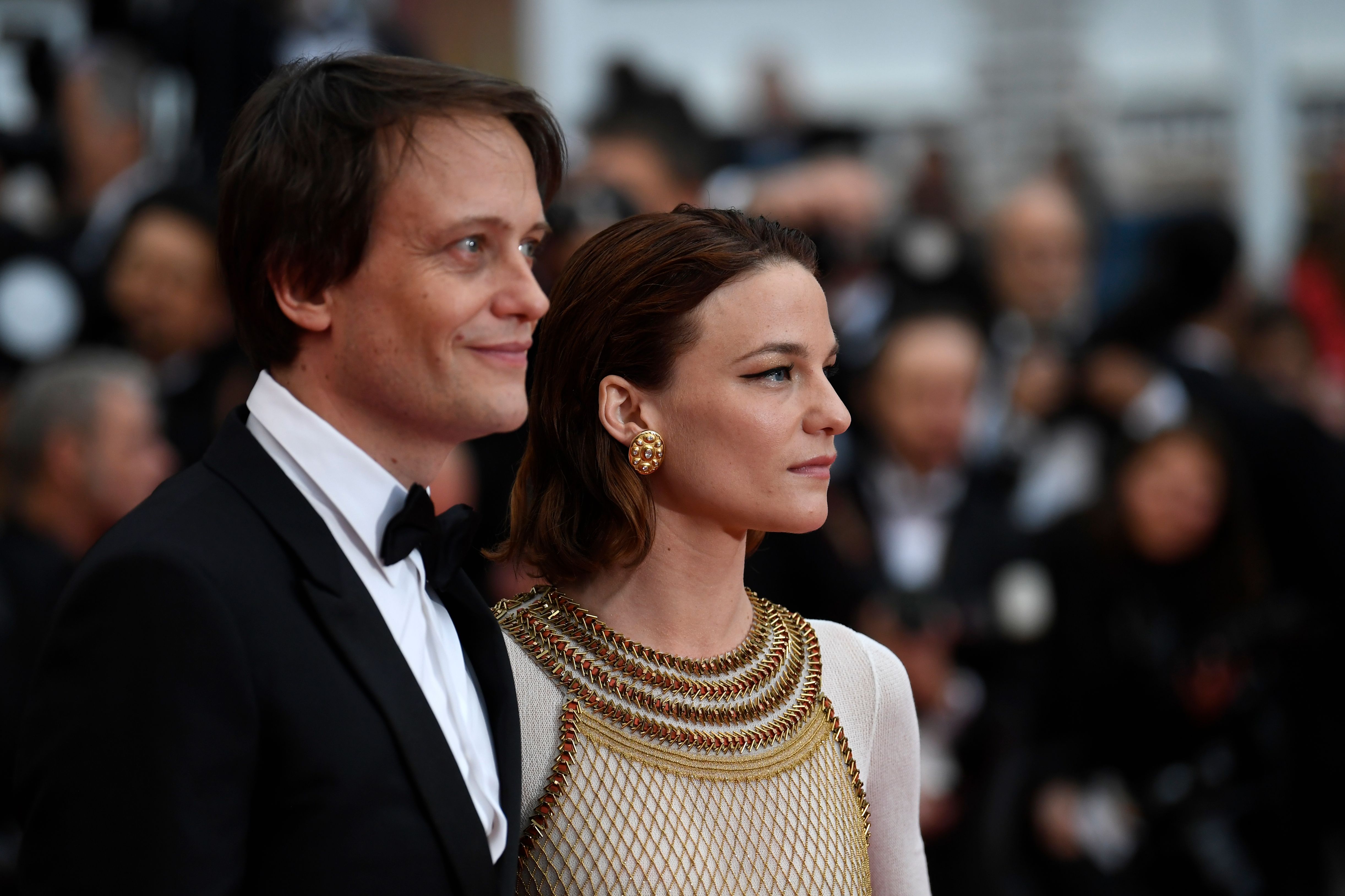 German actor August Diehl and Austrian actress Valerie Pachner arrive for the screening of the film "A Hidden Life" at the 72nd edition of the Cannes Film Festival on May 19, 2019.