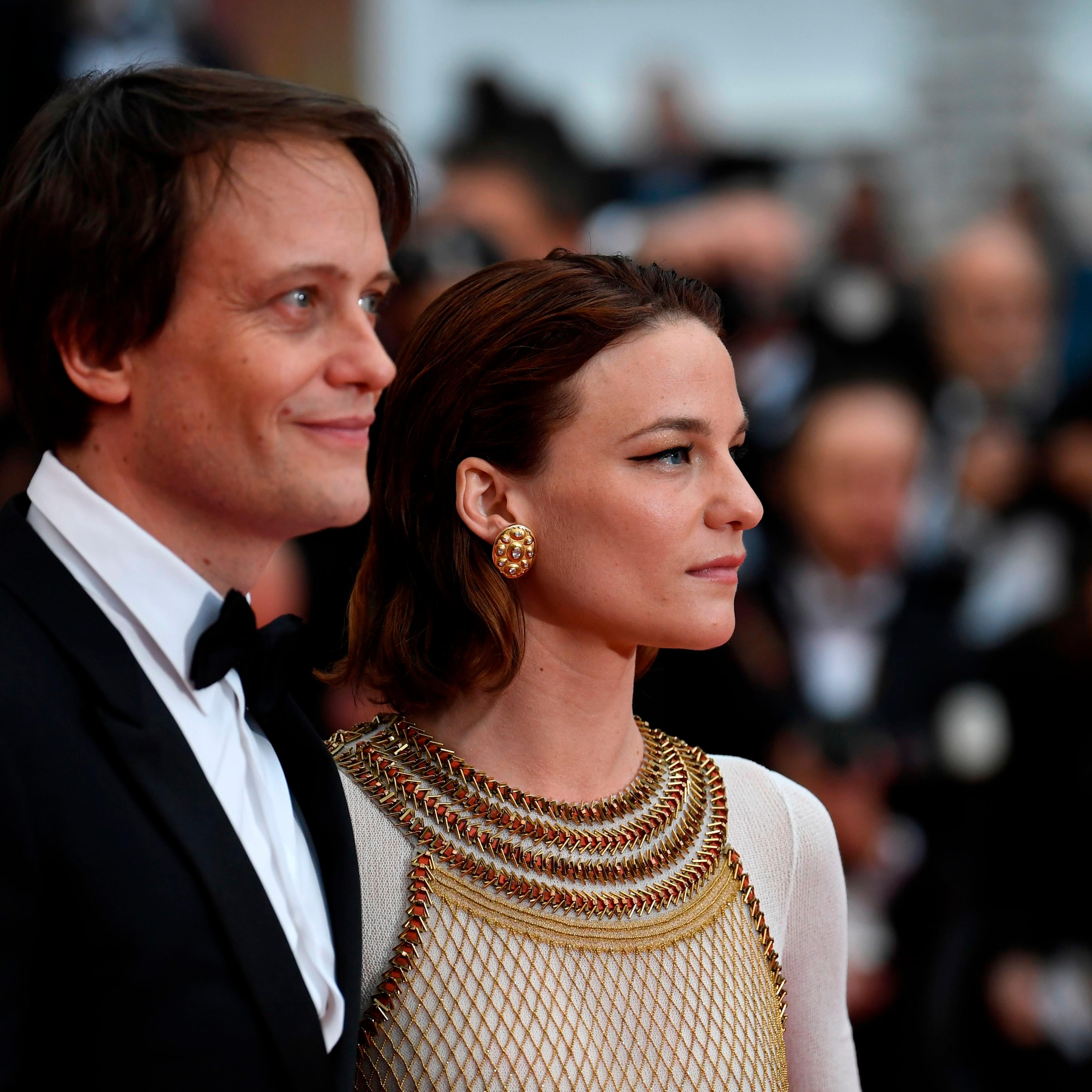 German actor August Diehl and Austrian actress Valerie Pachner arrive for the screening of the film "A Hidden Life" at the 72nd edition of the Cannes Film Festival on May 19, 2019.