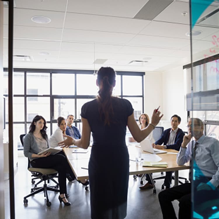 businesswoman-leading-meeting