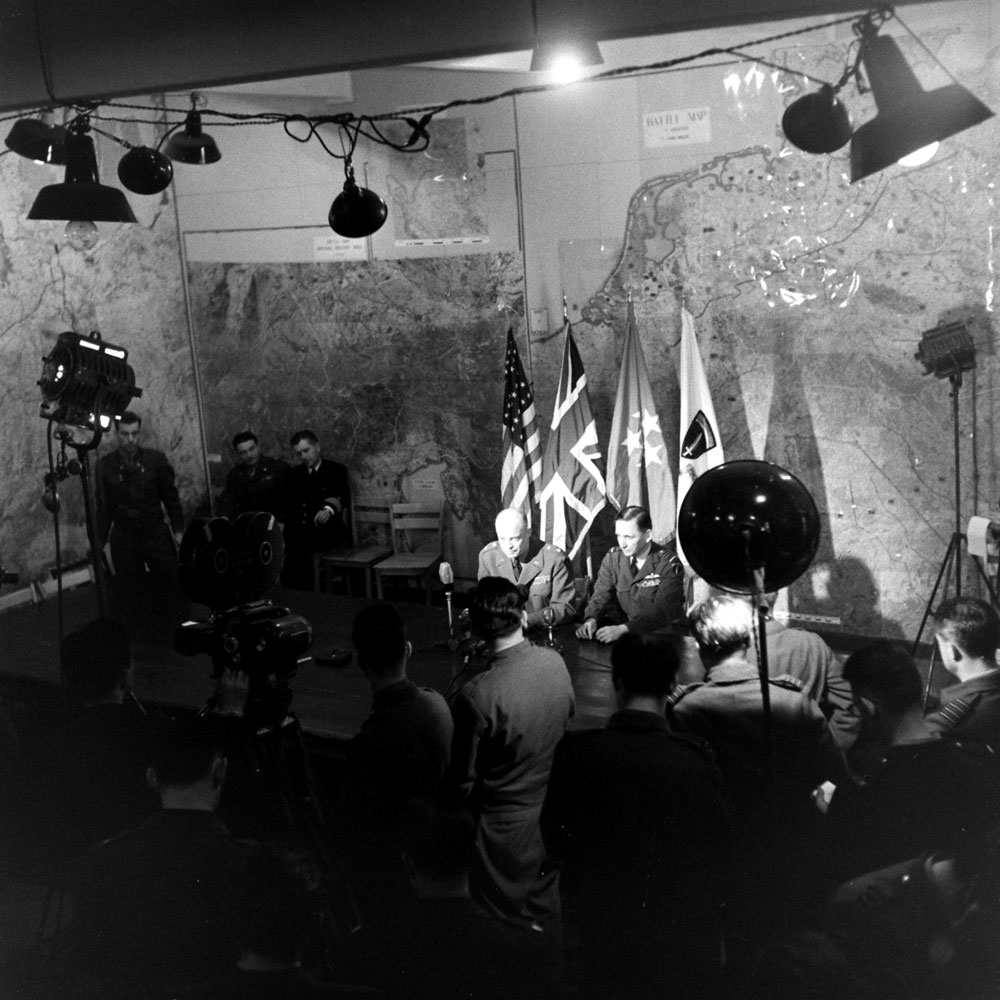 Gen. Dwight D. Eisenhower shares news of German surrender, Reims, France, May 7, 1945.