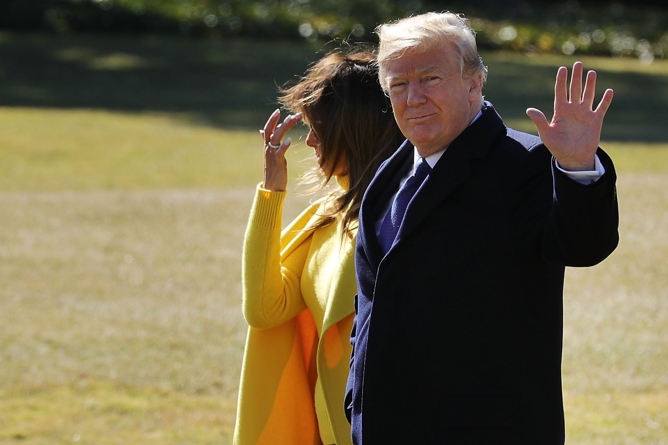 U.S. President Donald Trump (R) and first lady Melania Trump leave the White House February 5, 2018 in Washington, DC.
