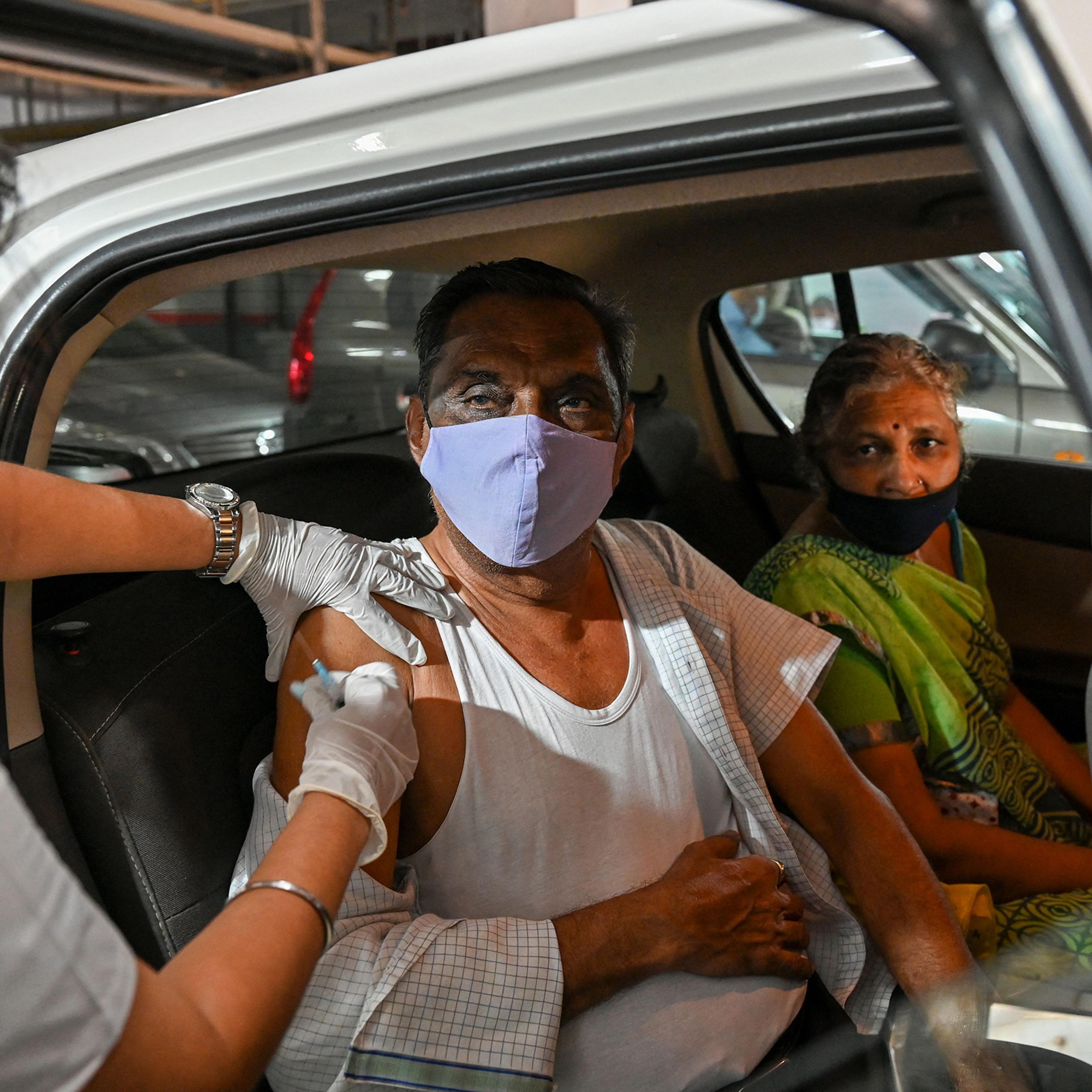 An elderly man receives a dose of the Covishield vaccine in Mumbai on May 4, 2021.