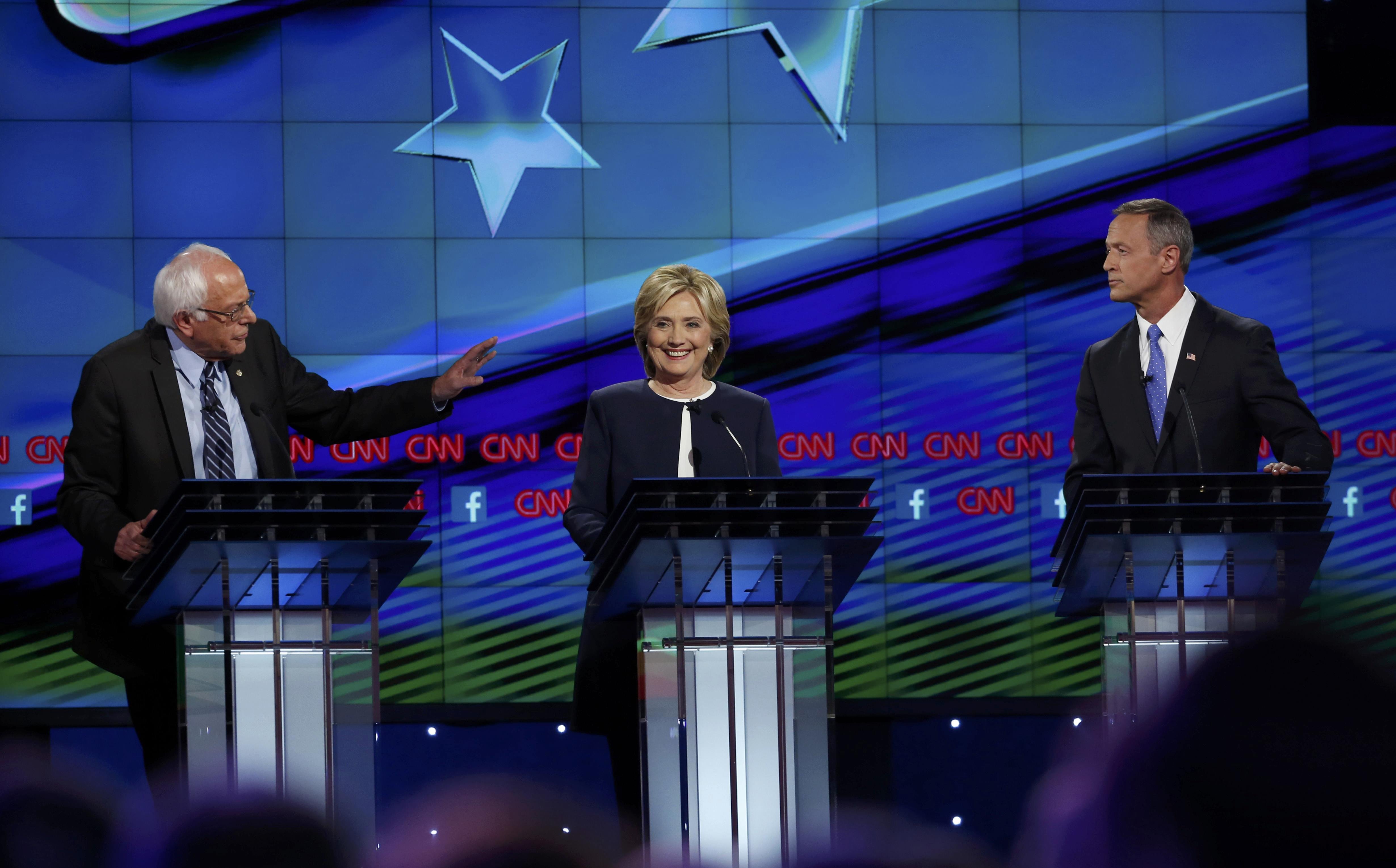 Democratic presidential candidates Sanders, Clinton and O'Malley debate during the first official Democratic candidates debate of the 2016 presidential campaign in Las Vegas