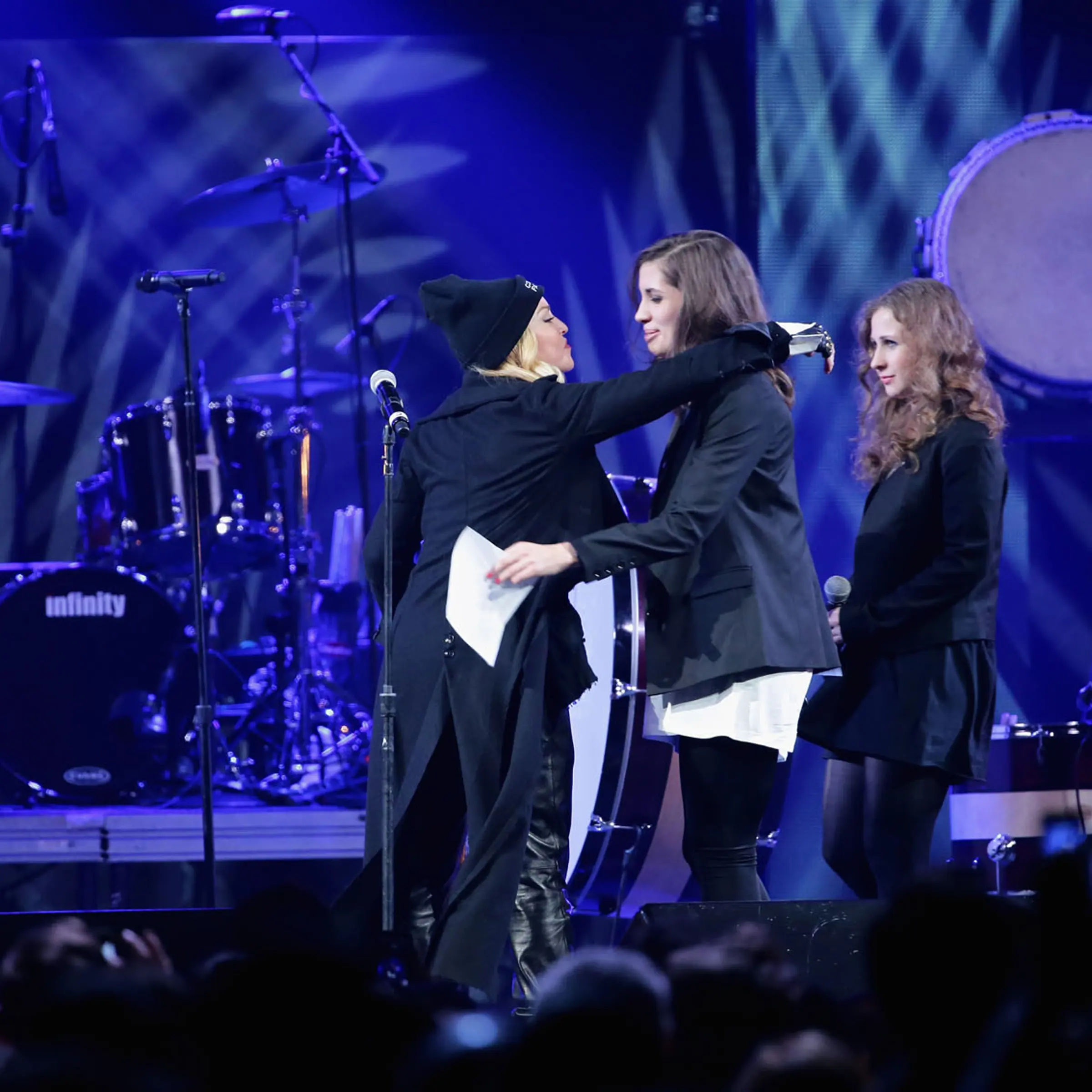 Madonna introduces Nadezhda Tolokonnikova, and Maria Alyokhina, formerly of Pussy Riot, onstage at the Amnesty International Concert presented by the CBGB Festival at Barclays Center on February 5, 2014 in New York City.